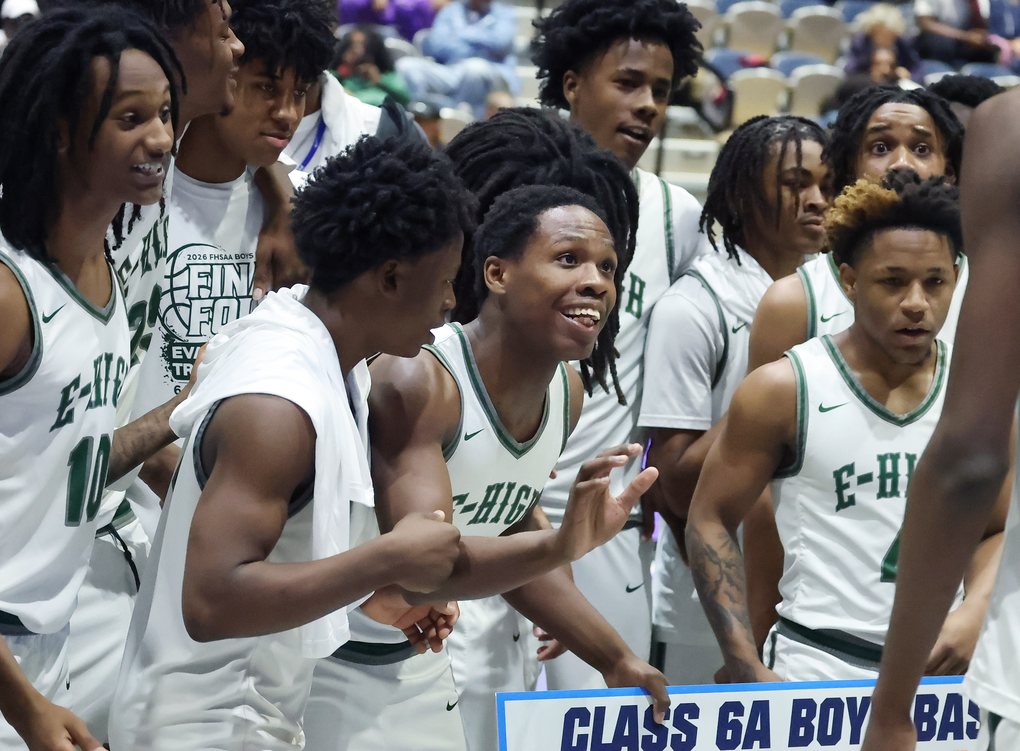Evans players celebrate after winning the Lake Howell versus Evans...