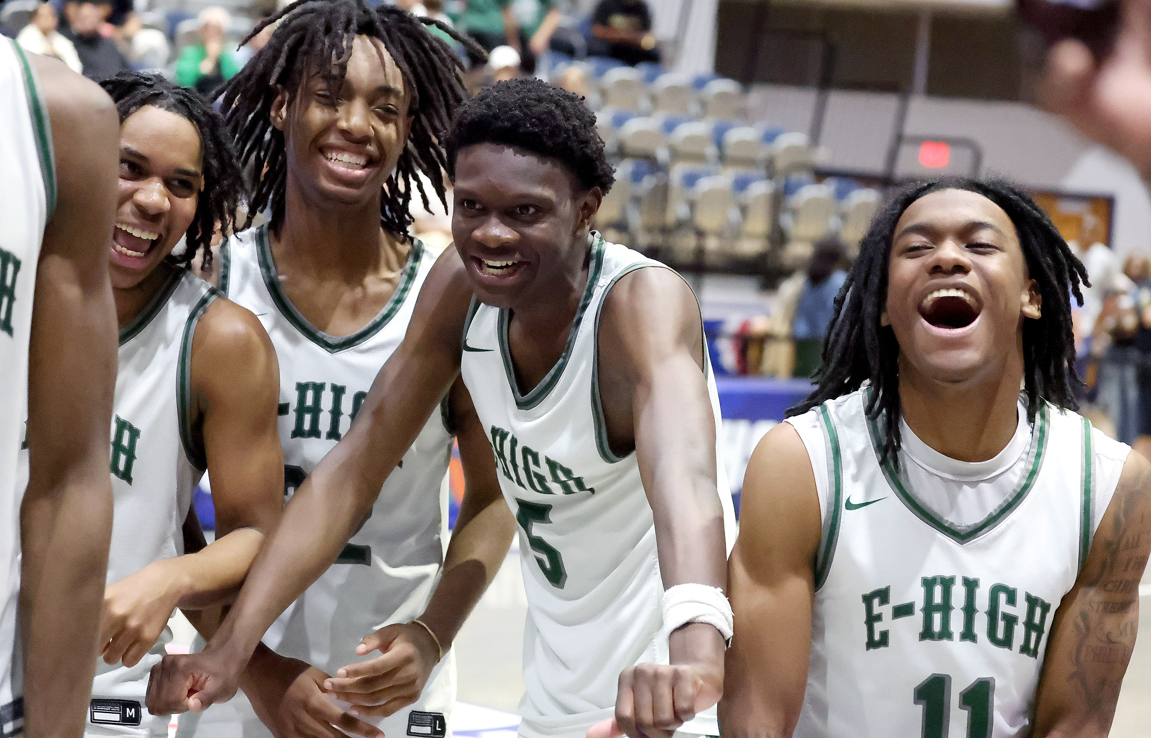 Evans players celebrate after winning the Lake Howell versus Evans...