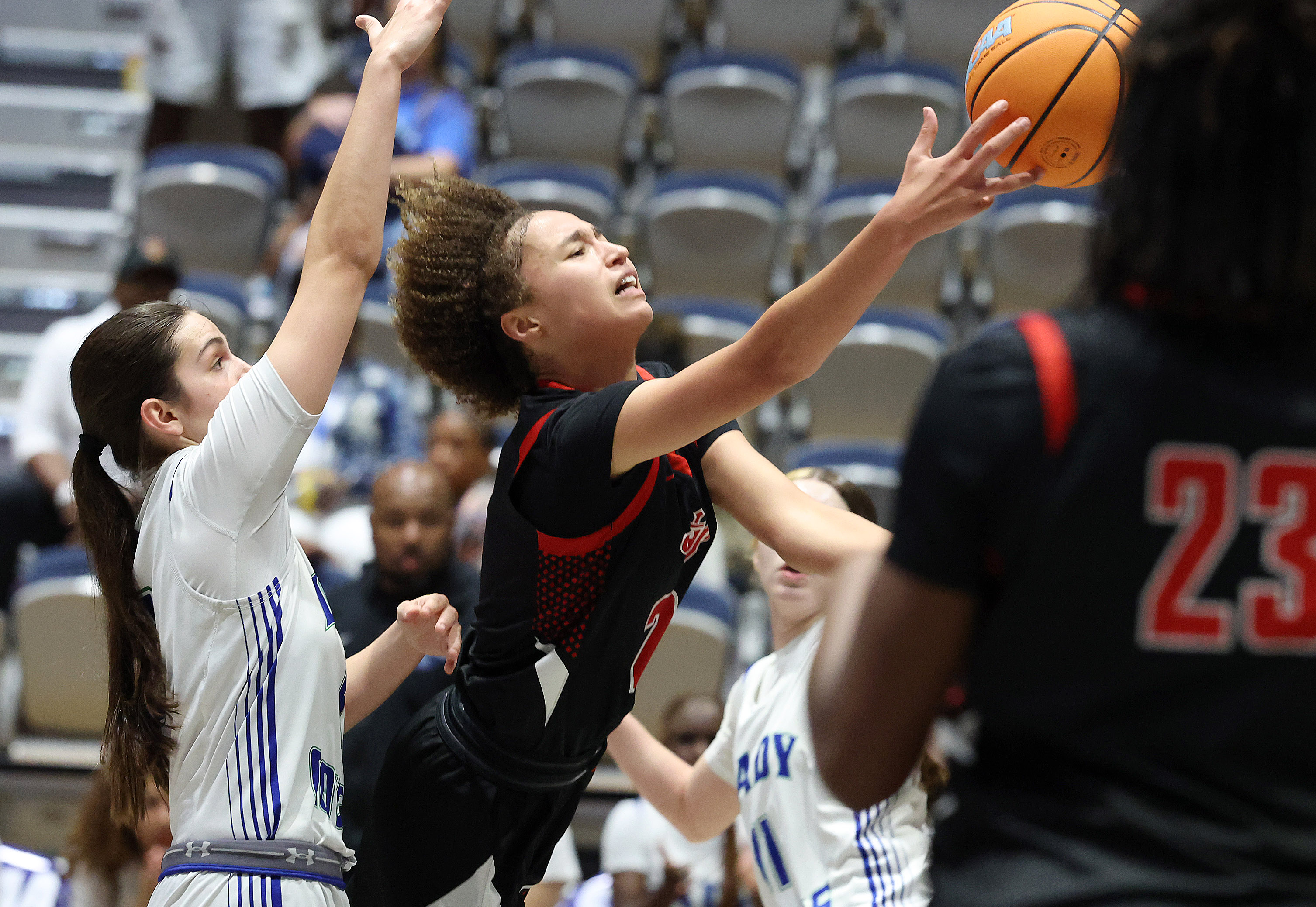 Lake Highland player Myanna Hatchette puts up a shot during...