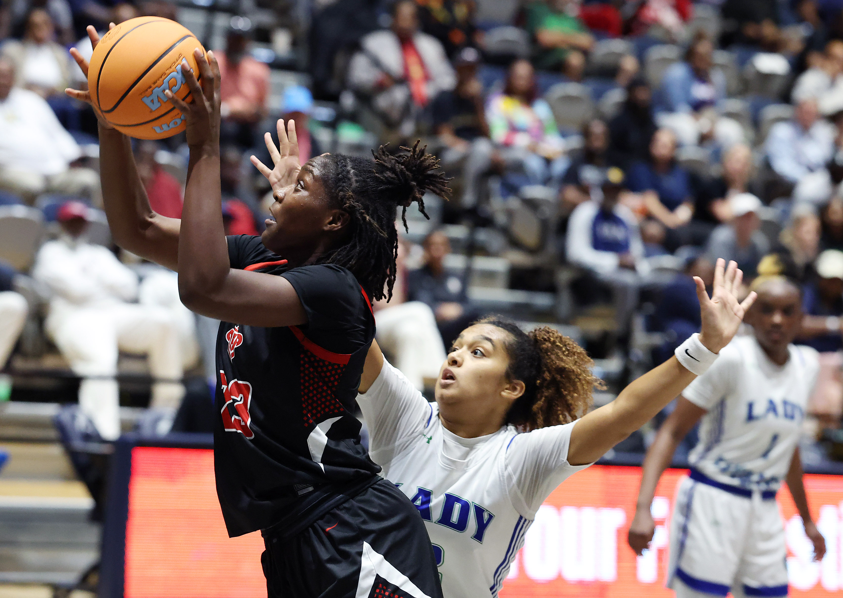Lake Highland player Saleigh Simpson (23) shoots during the FHSAA...