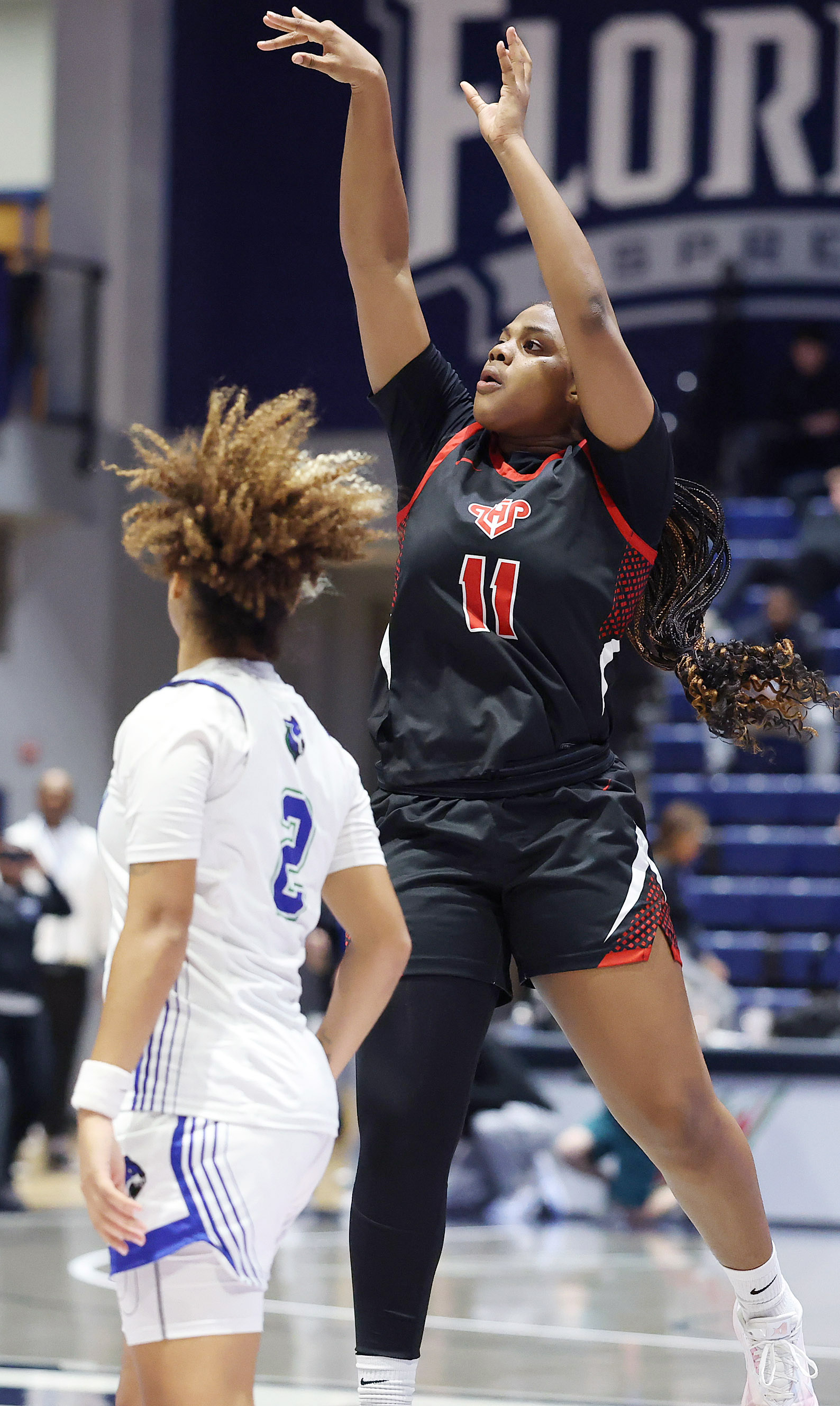 Lake Highland player Aubrey Griffin (11) shoots during the FHSAA...