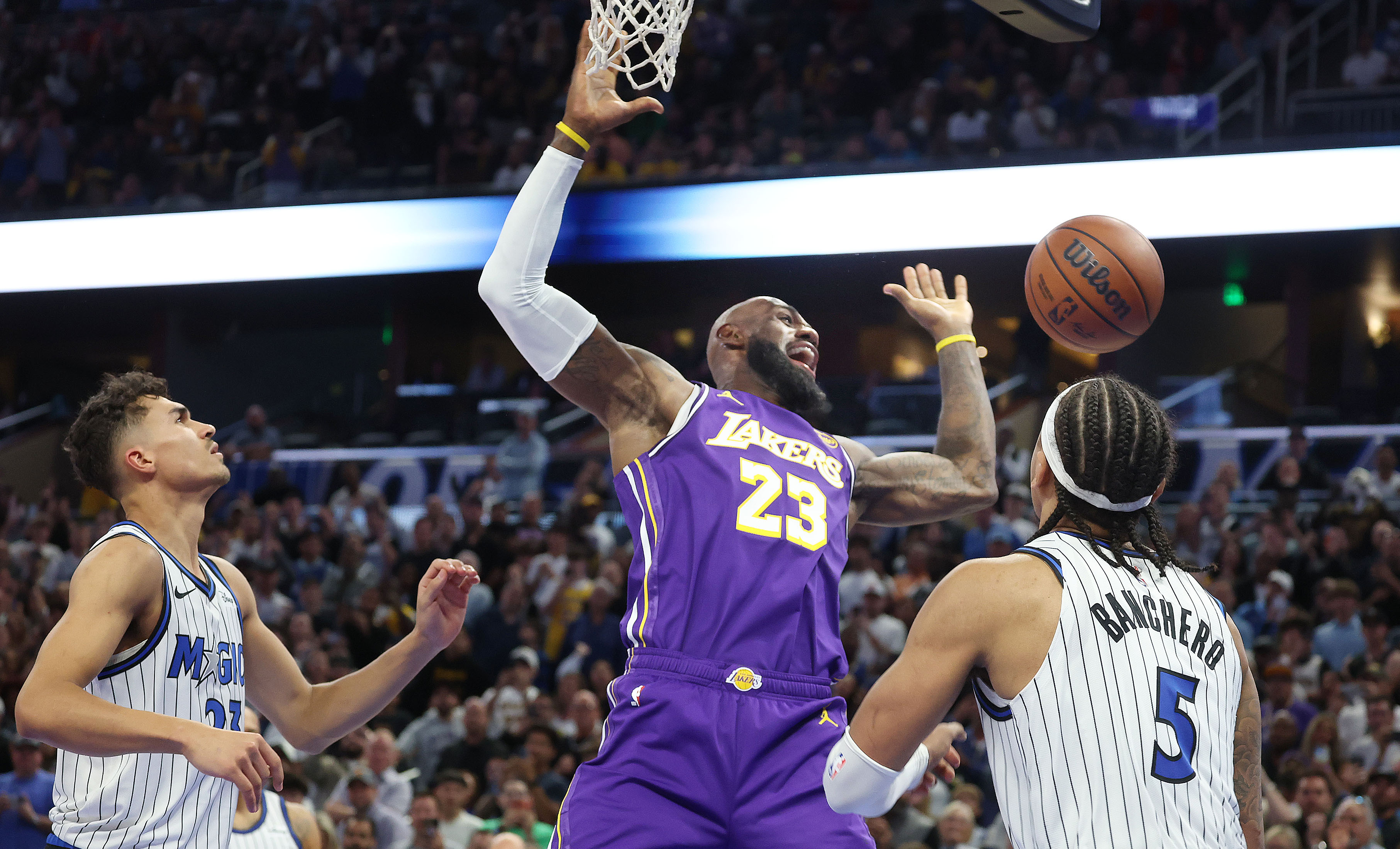 LA forward LeBron James (middle) yells as he loses the...