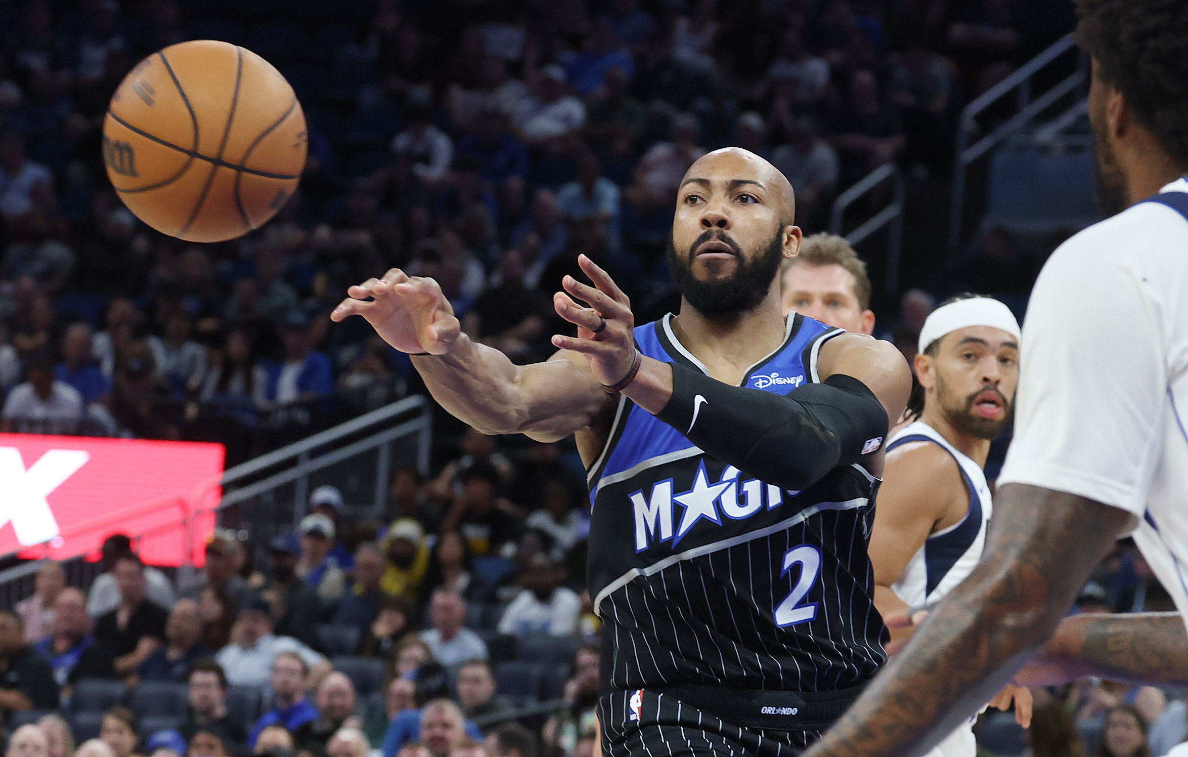 Orlando guard Jevon Carter passes during the Dallas Mavericks at...