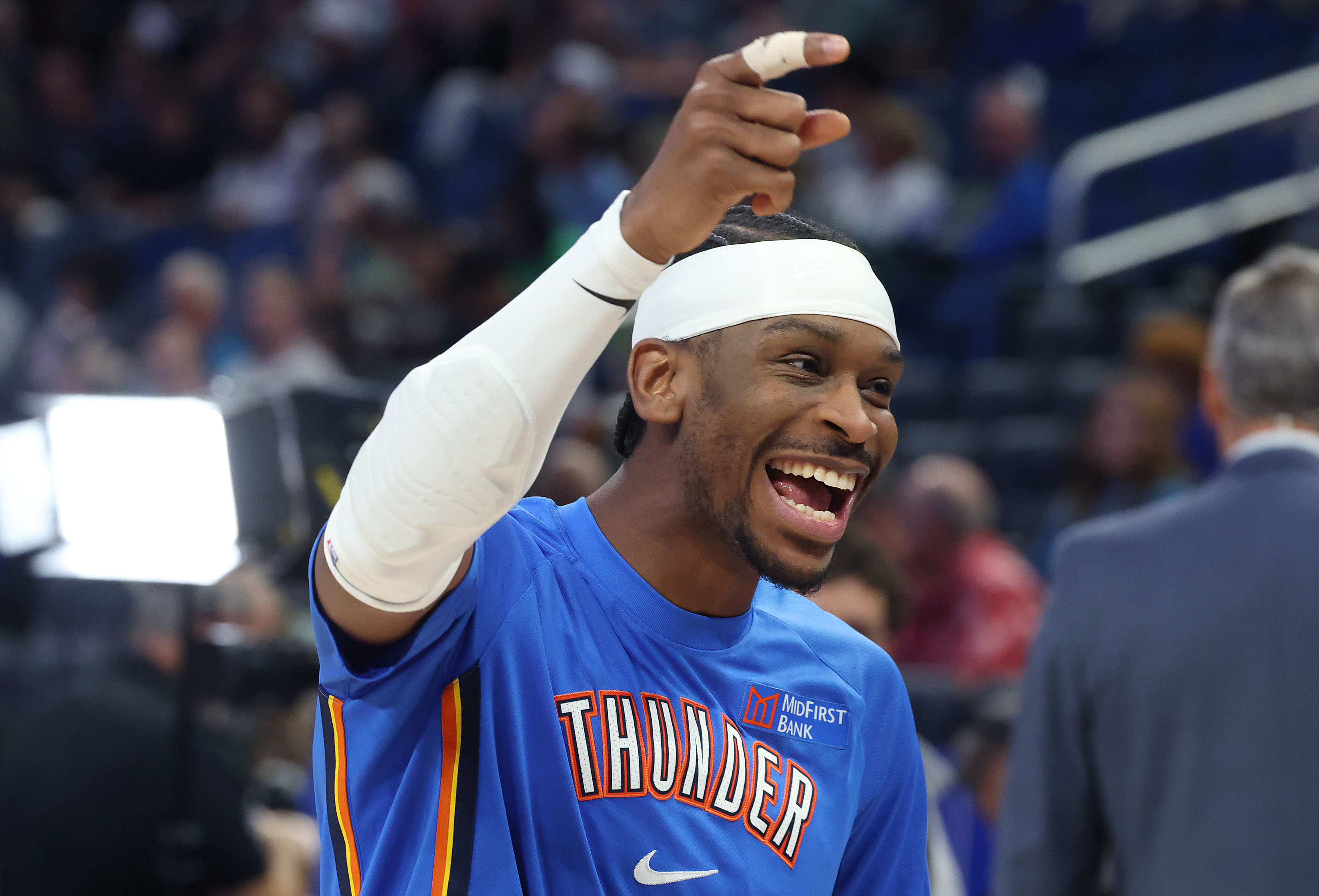 Thunder guard Shai Gilgeous-Alexander smiles in pregame warmups before the...