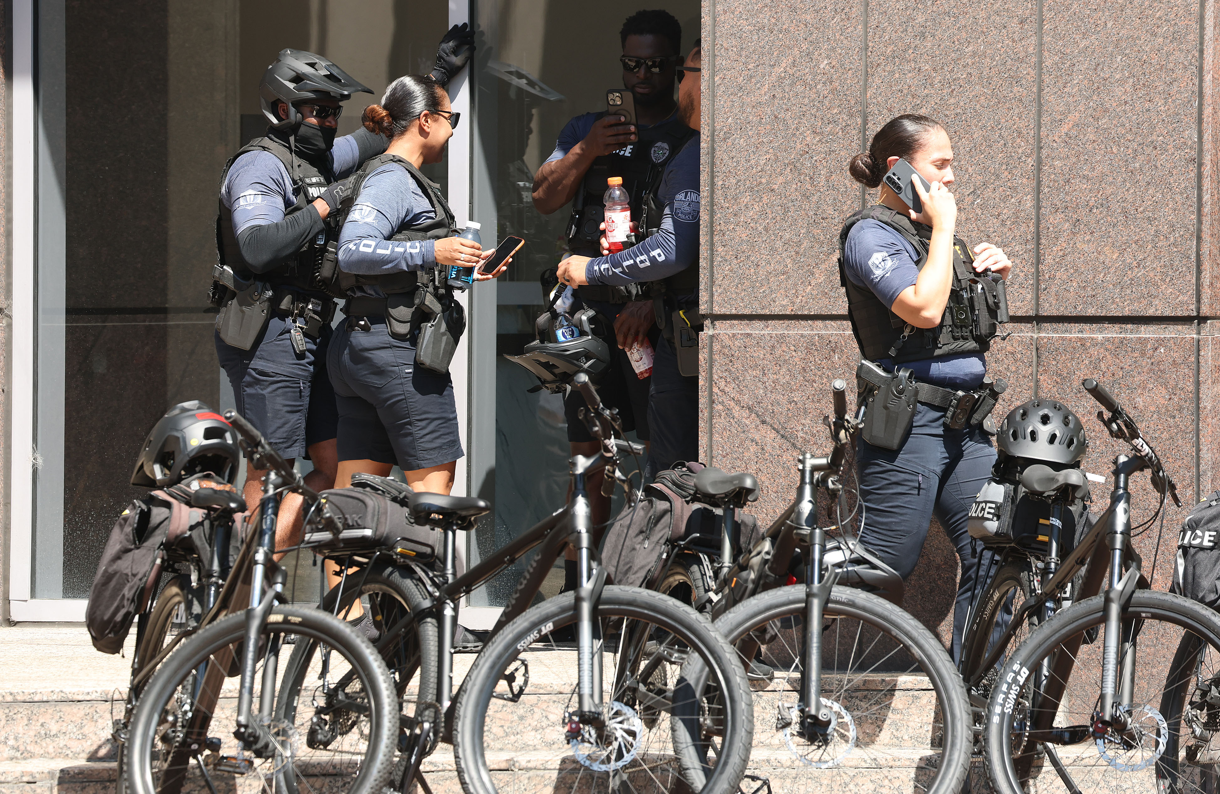 Police monitor as thousands protest in front of Orlando City...