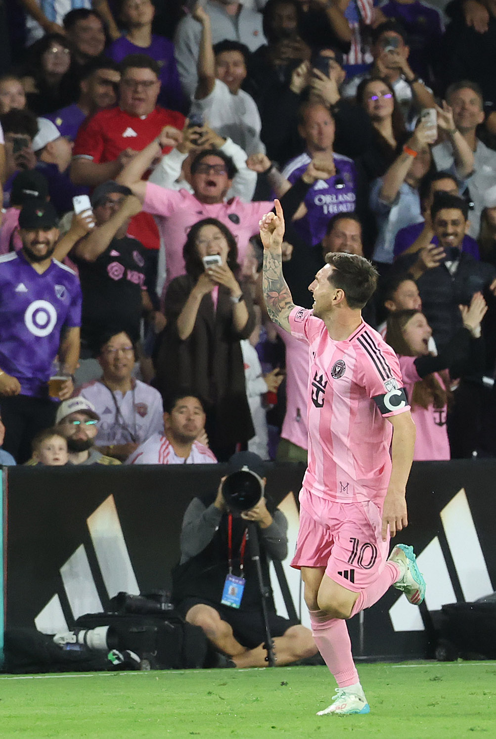 Miami player Lionel Messi celebrates with teammates after scoring a...