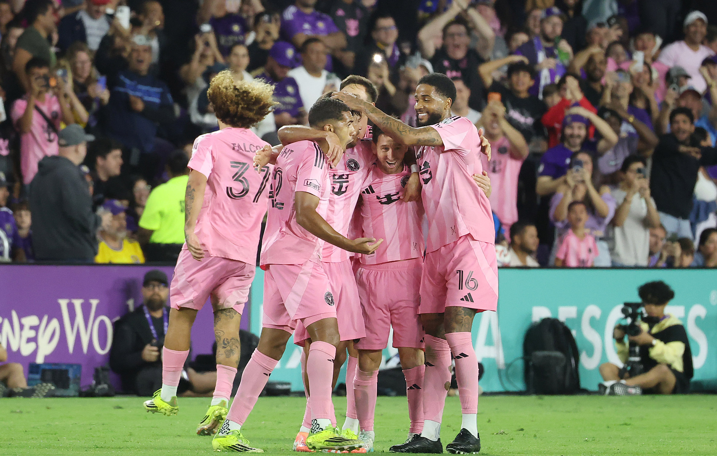 Miami player Lionel Messi (middle) celebrates with teammates after scoring...