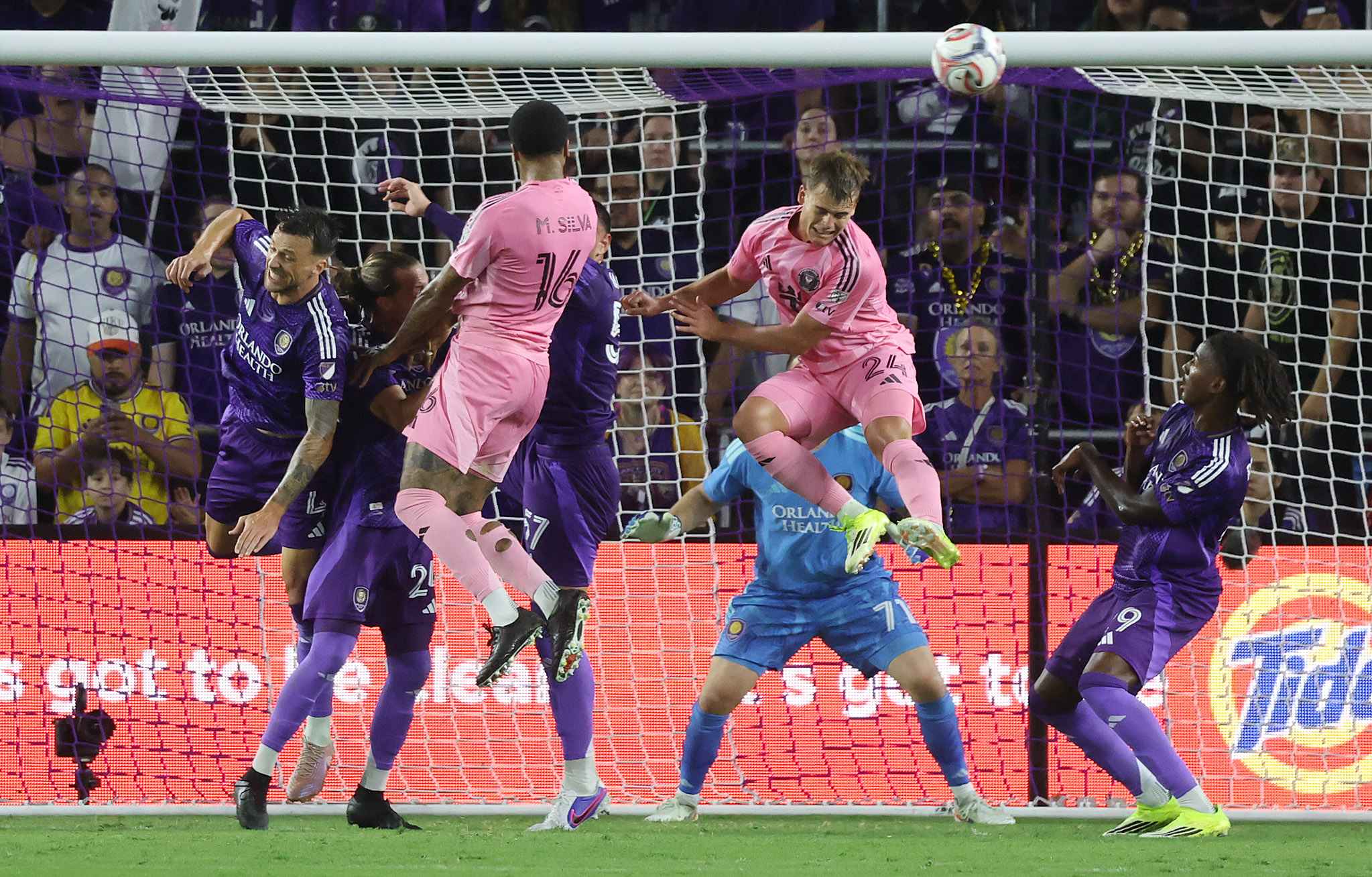 Miami player Mateo Silvetti (24) heads the ball in front...