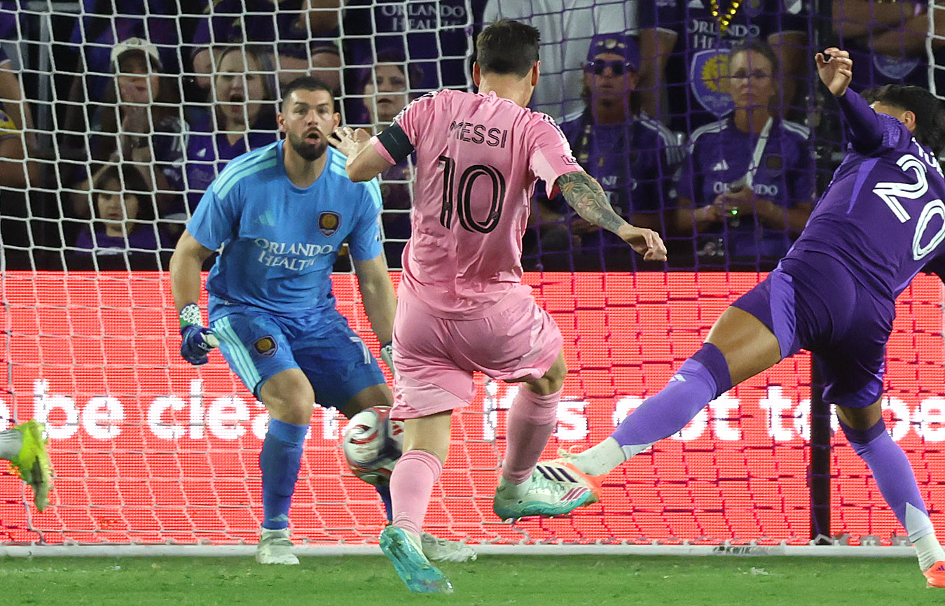 Miami player Lionel Messi (10) kicks at Orlando goalkeeper Maxime...