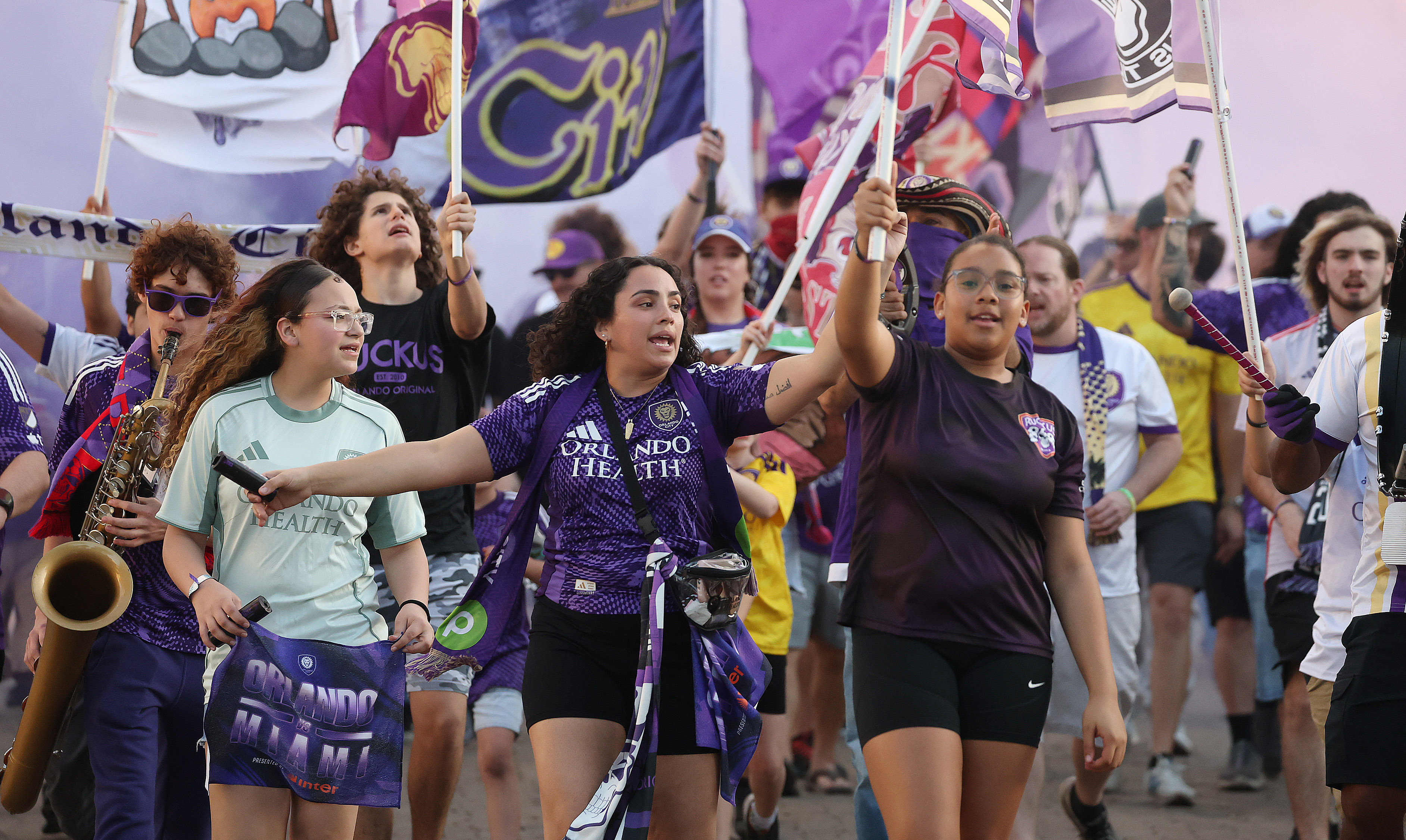 Orlando fans march into the stadium before the Inter Miami...