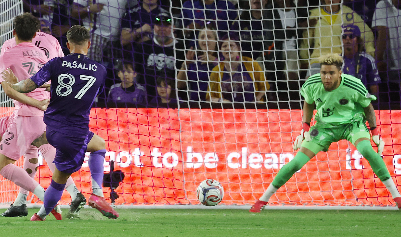Orlando player Marco Pasalic (87) scores a goal past Miami...