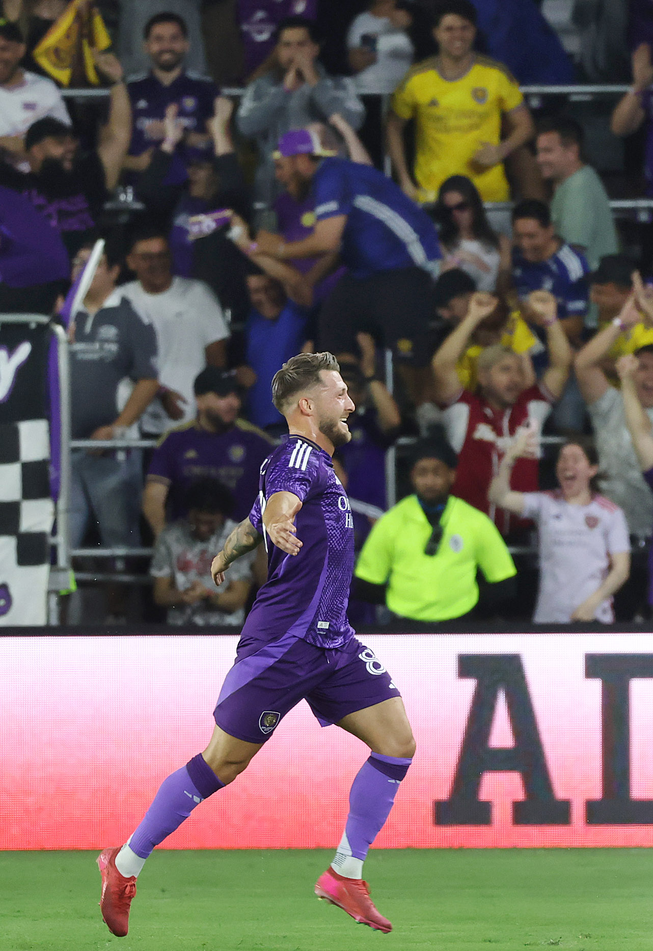 Orlando player Marco Pasalic celebrates after he scored a goal...