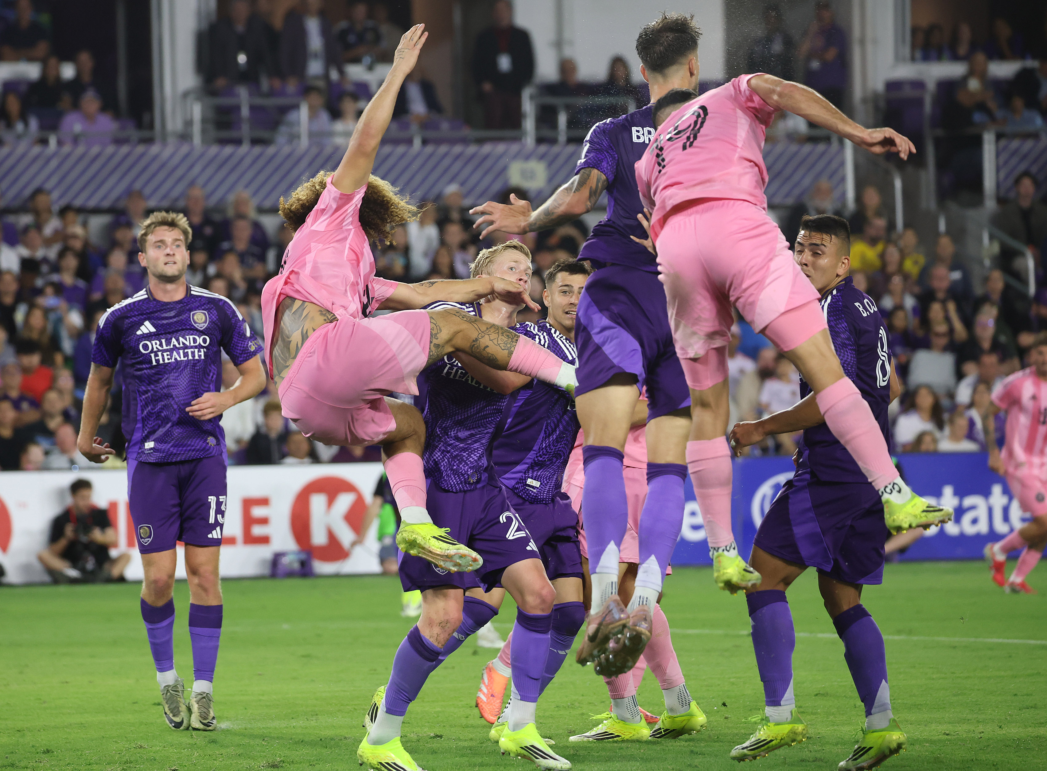 Players collide on a corner kick during the Inter Miami...
