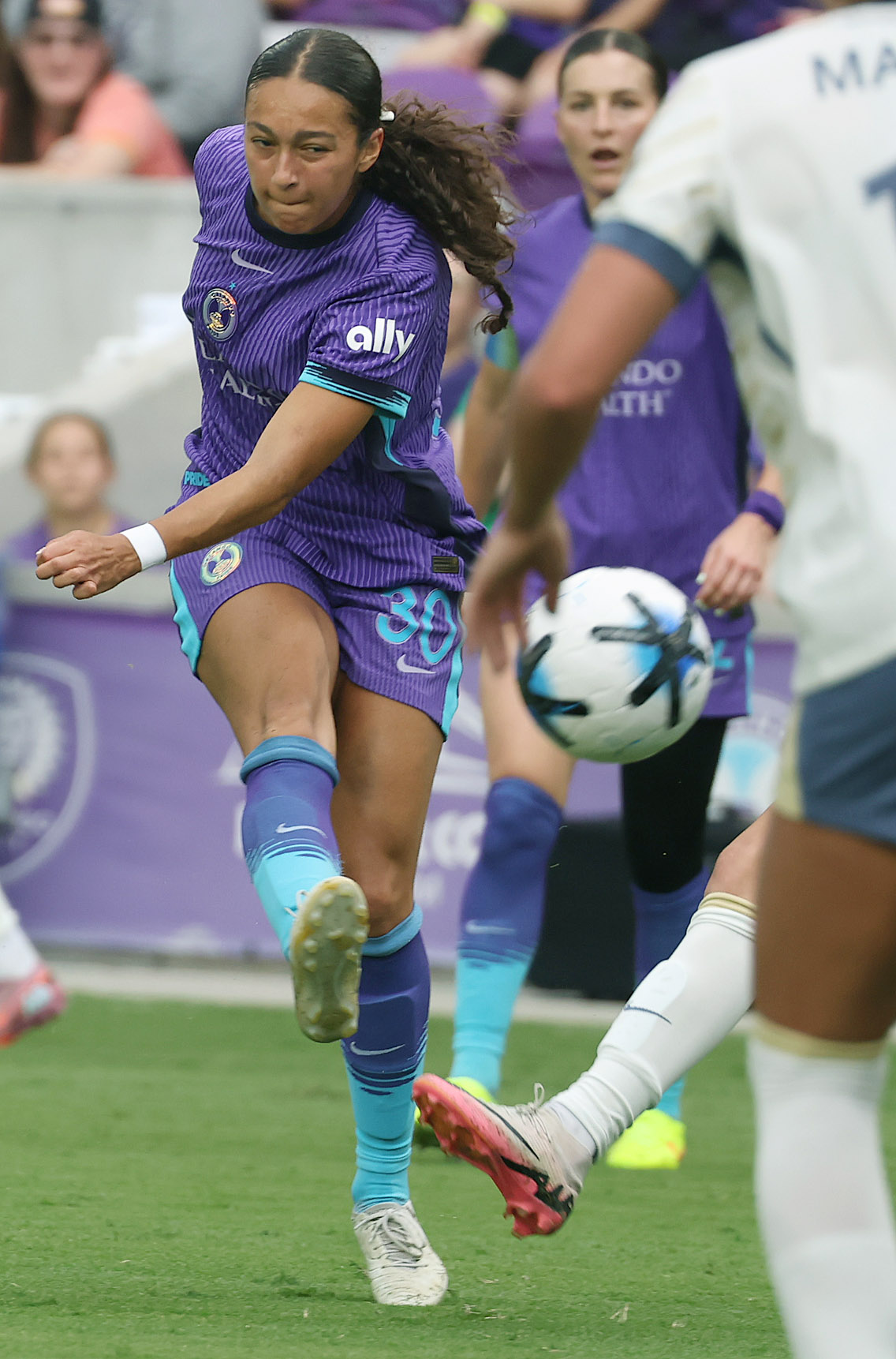 Orlando player Seven Castain kicks during the Seattle Reign at...