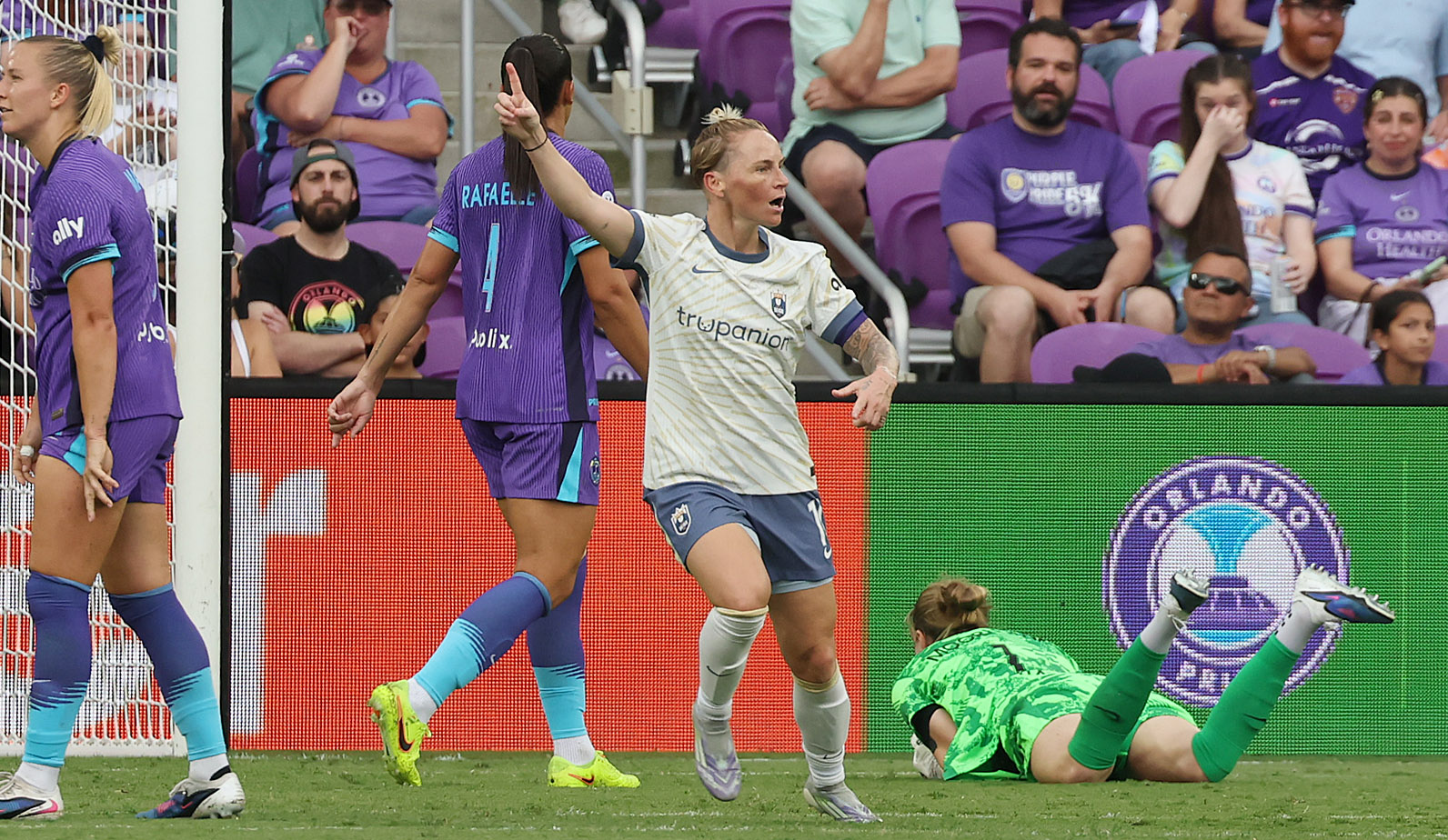 Seattle players Jess Fishlock (middle) celebrates after a Fishlock goal...