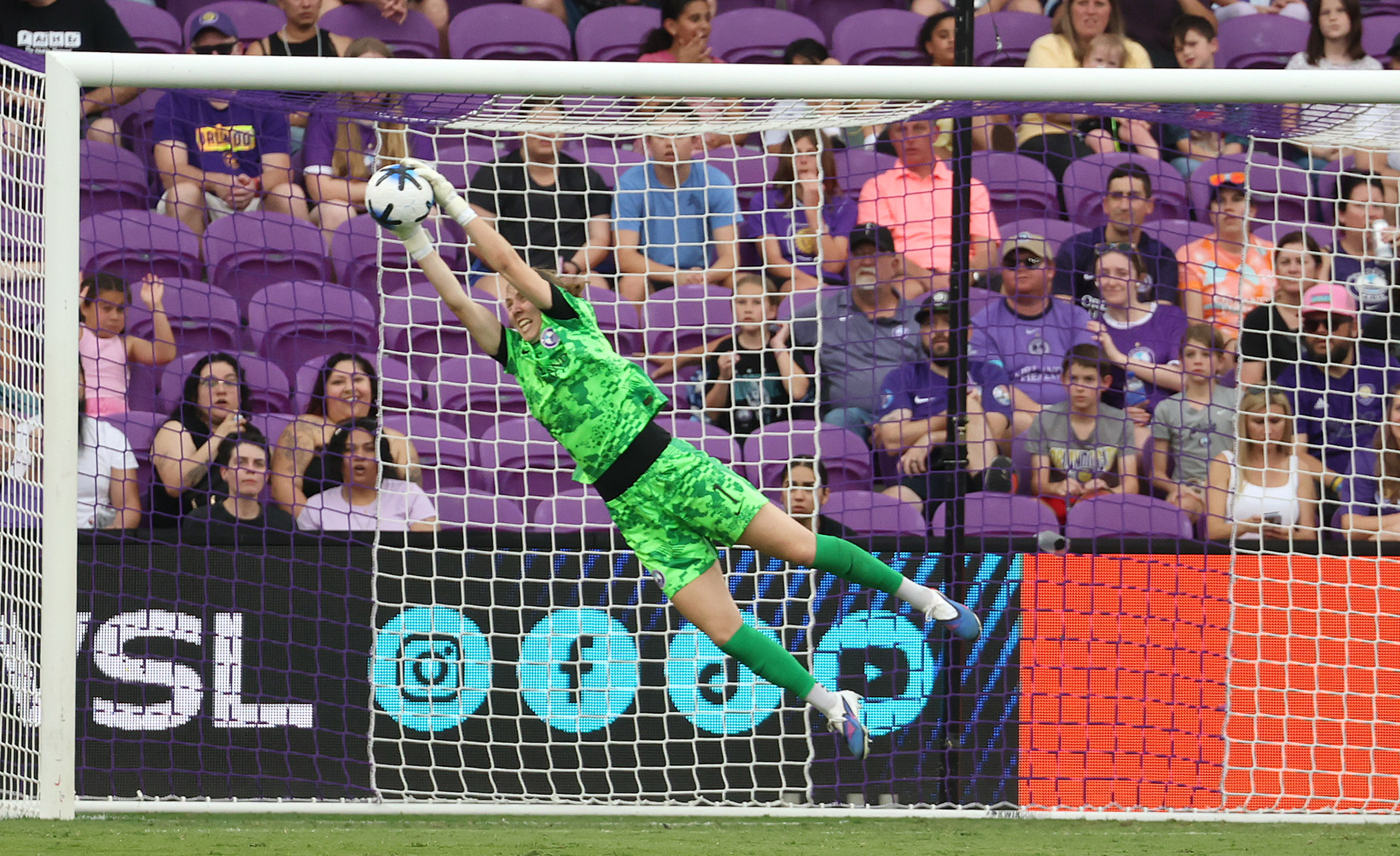 Orlando goalkeeper Anna Moorhouse makes a leaping save during the...