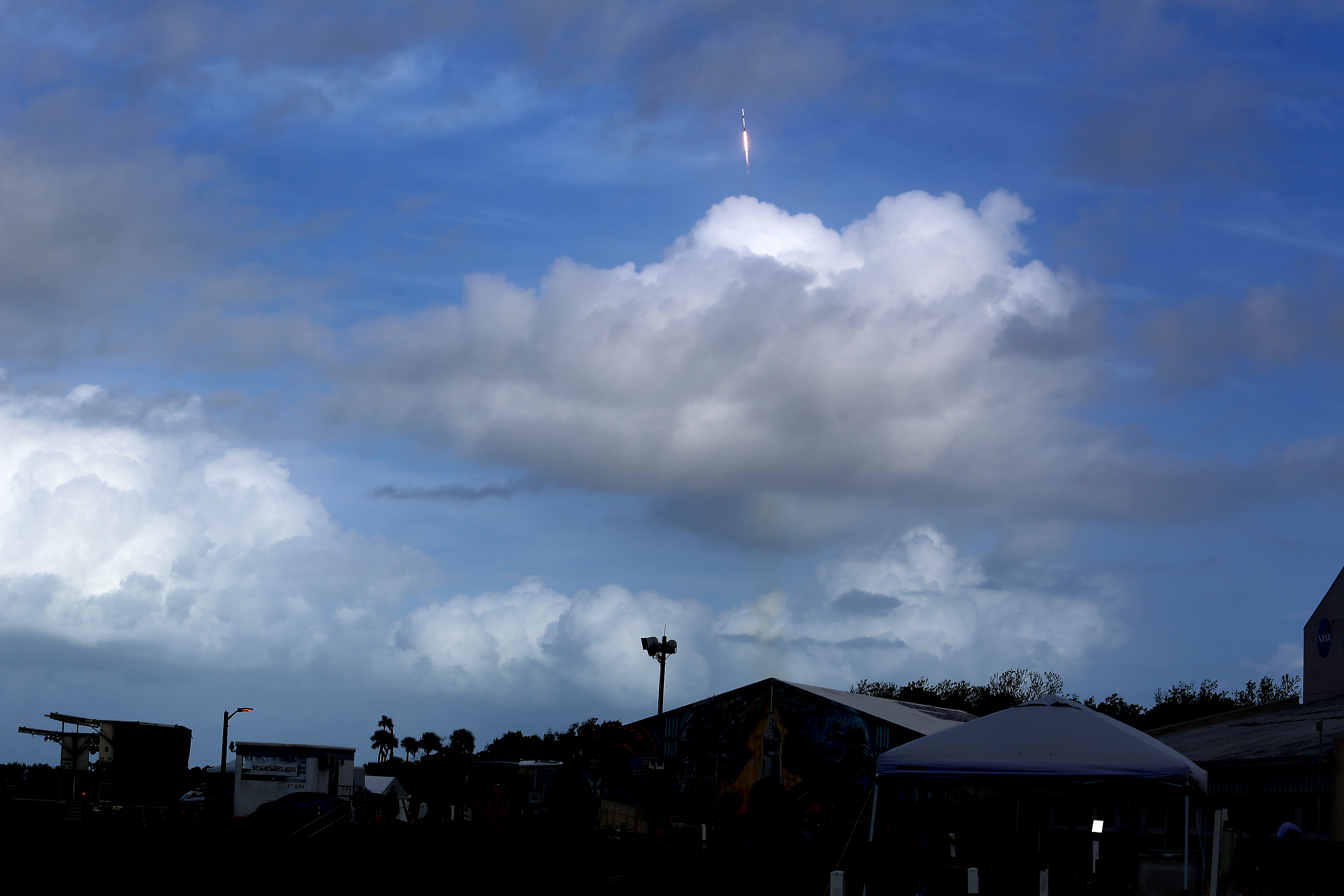 A SpaceX Falcon 9 rocket using a fleet-leading booster for...