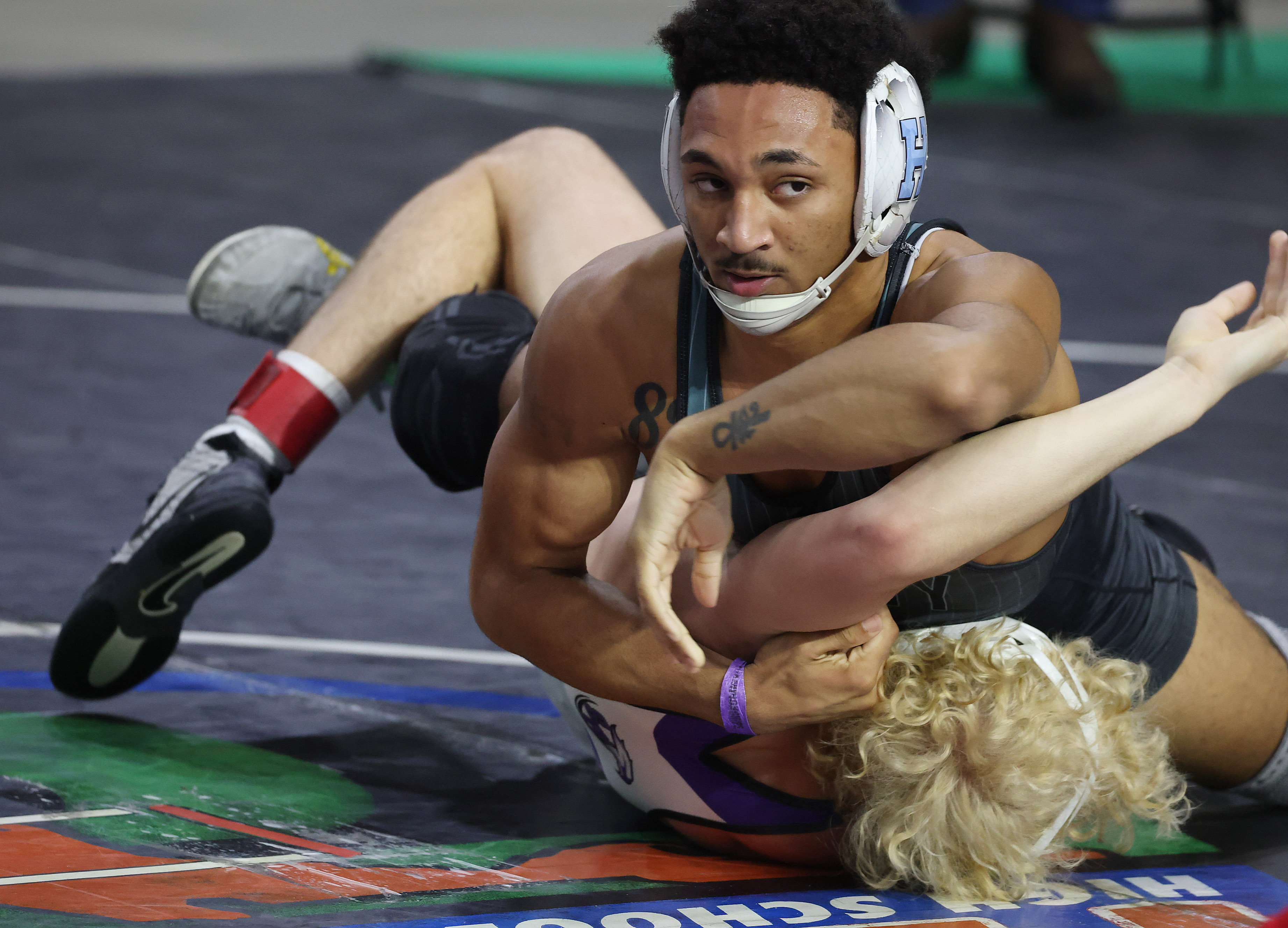 Hagerty High's Nikolas Blake, top, controls Southwest Miami's Didier Novoa...