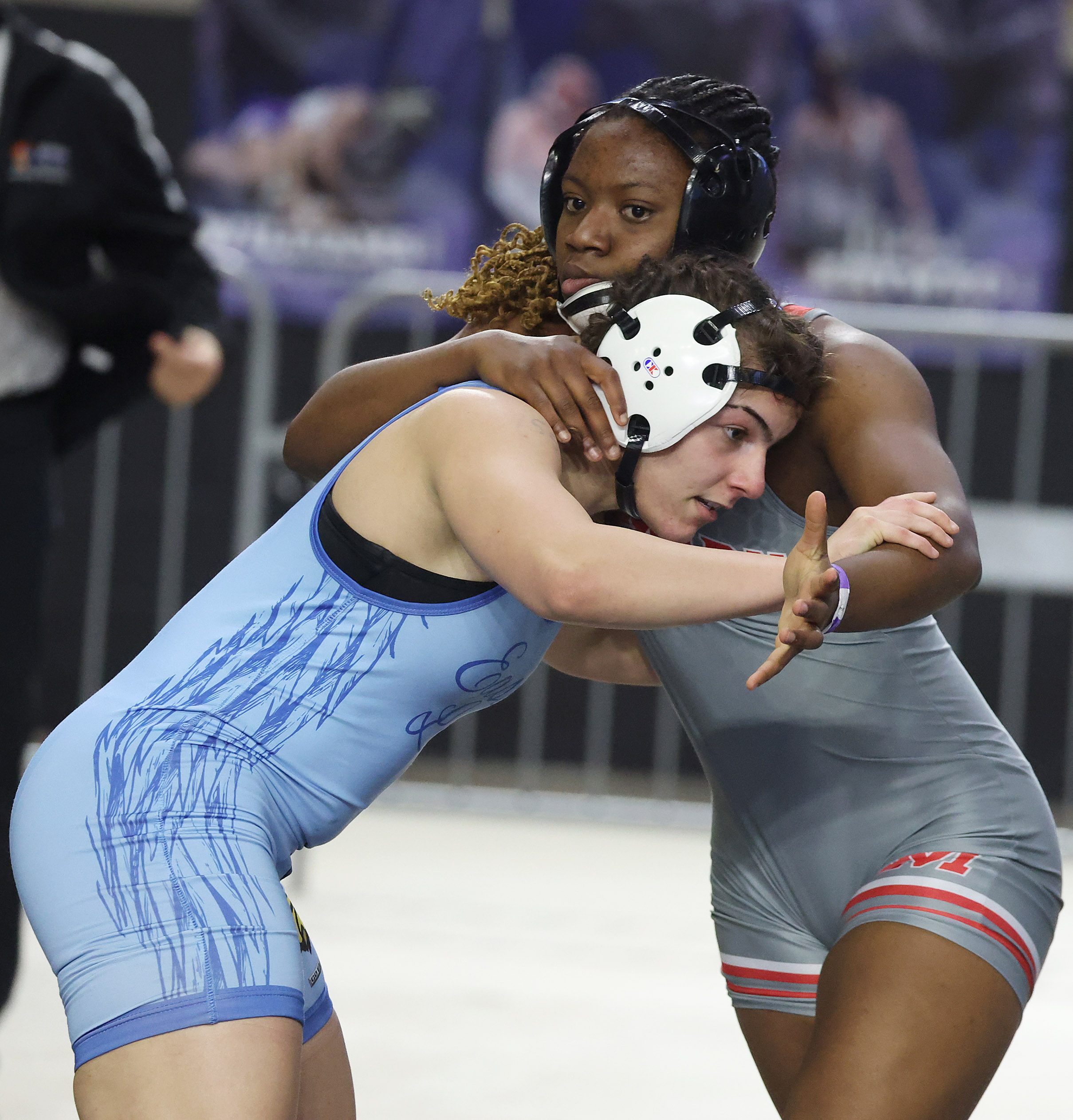 Lake Mary High's Zaria Slater (top) wrestles East Lake High's...