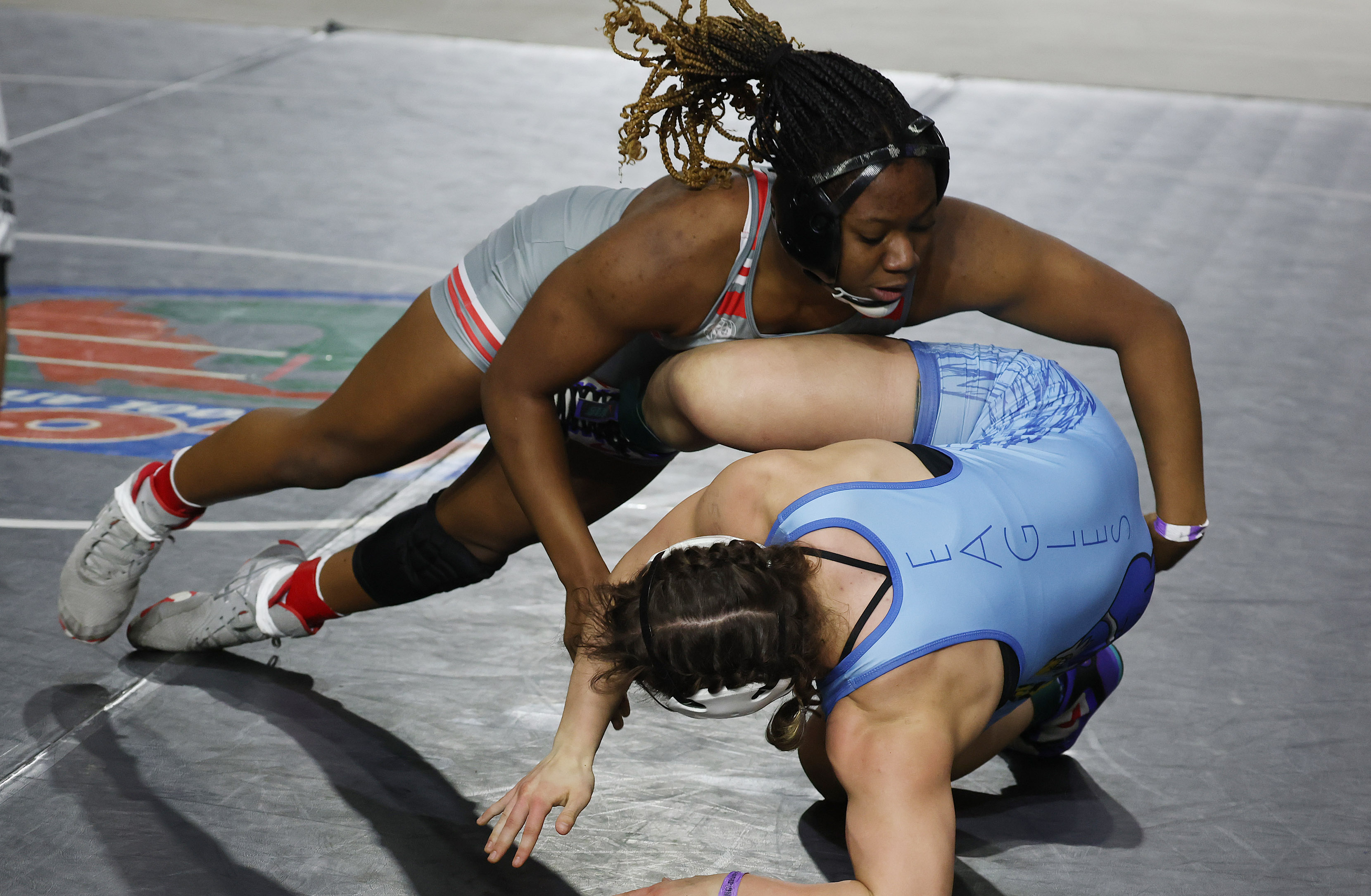 Lake Mary High's Zaria Slater (top) controls East Lake High's...