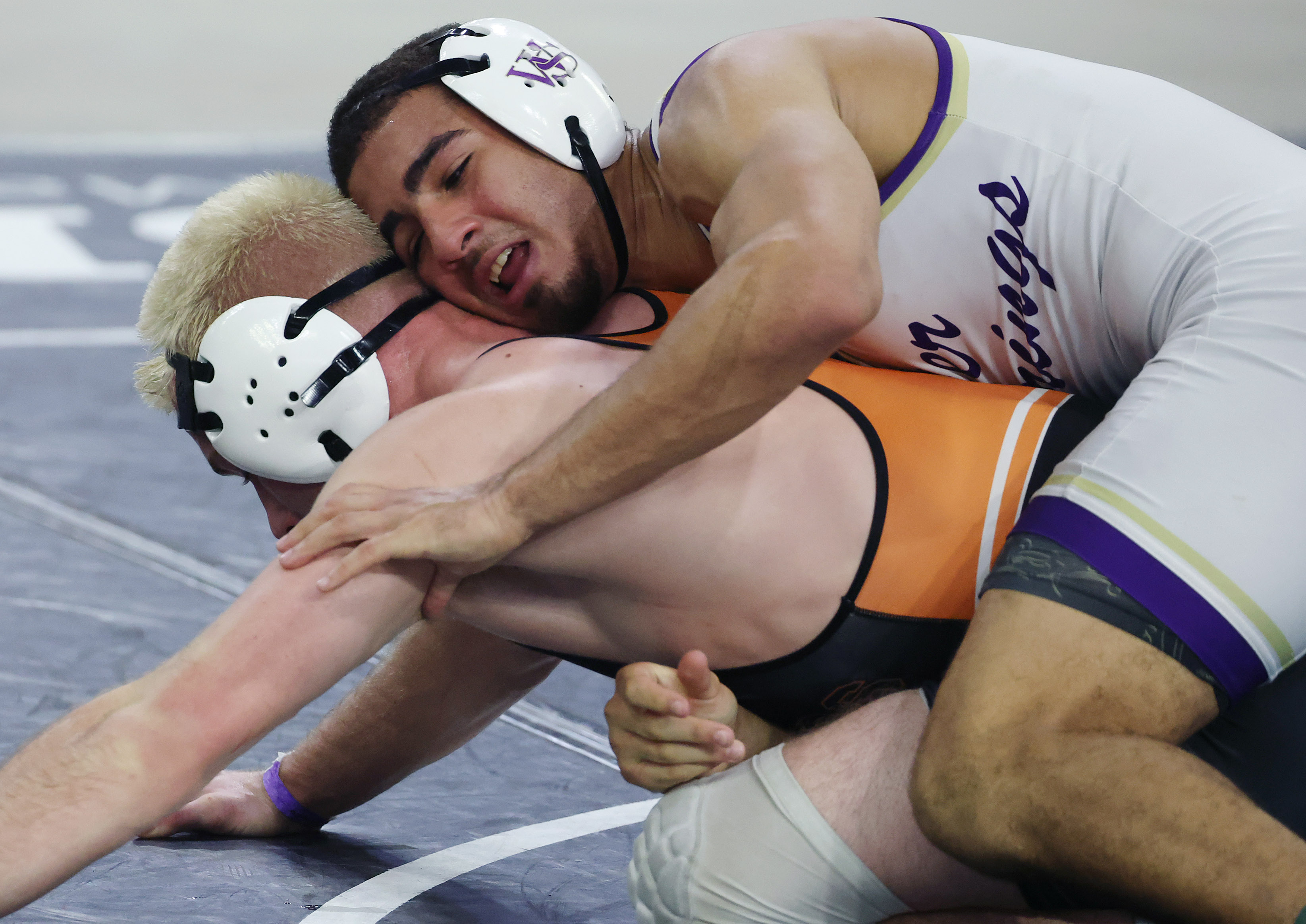 Winter Springs High's Jacob Rodriguez, top, controls Zephyrhills High's Andrew...
