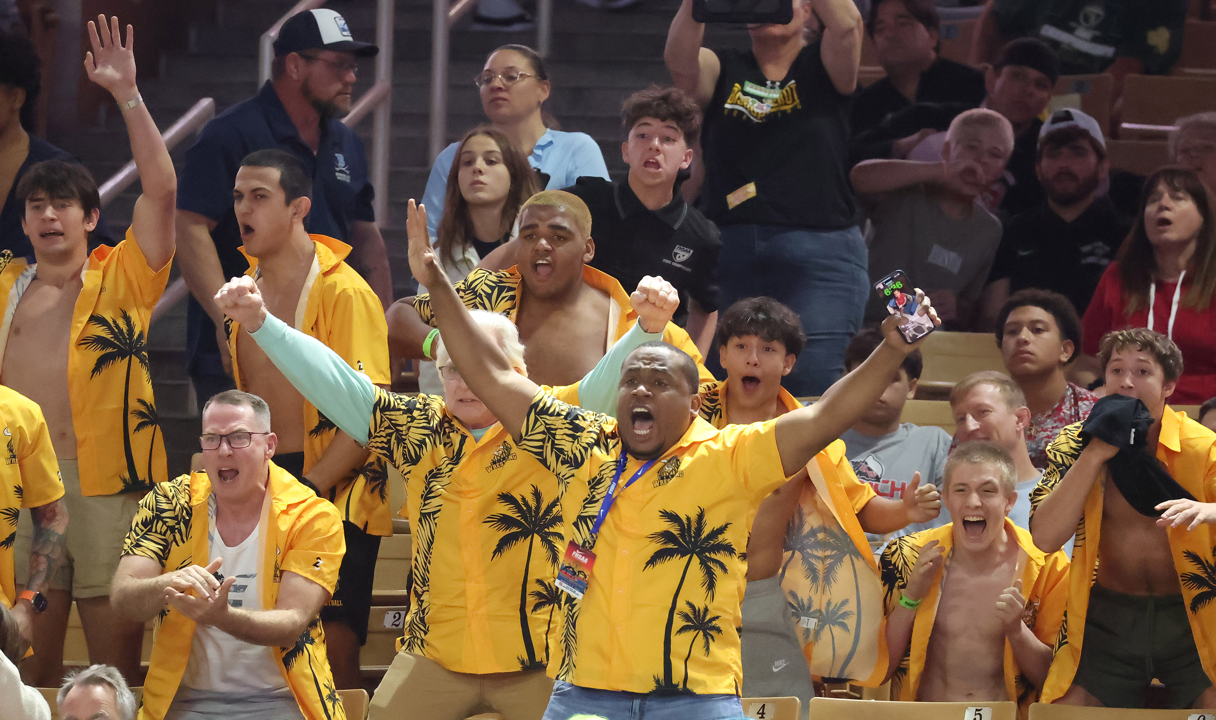 Fans cheers during the FHSAA Wrestling Championships at Silver Spurs...