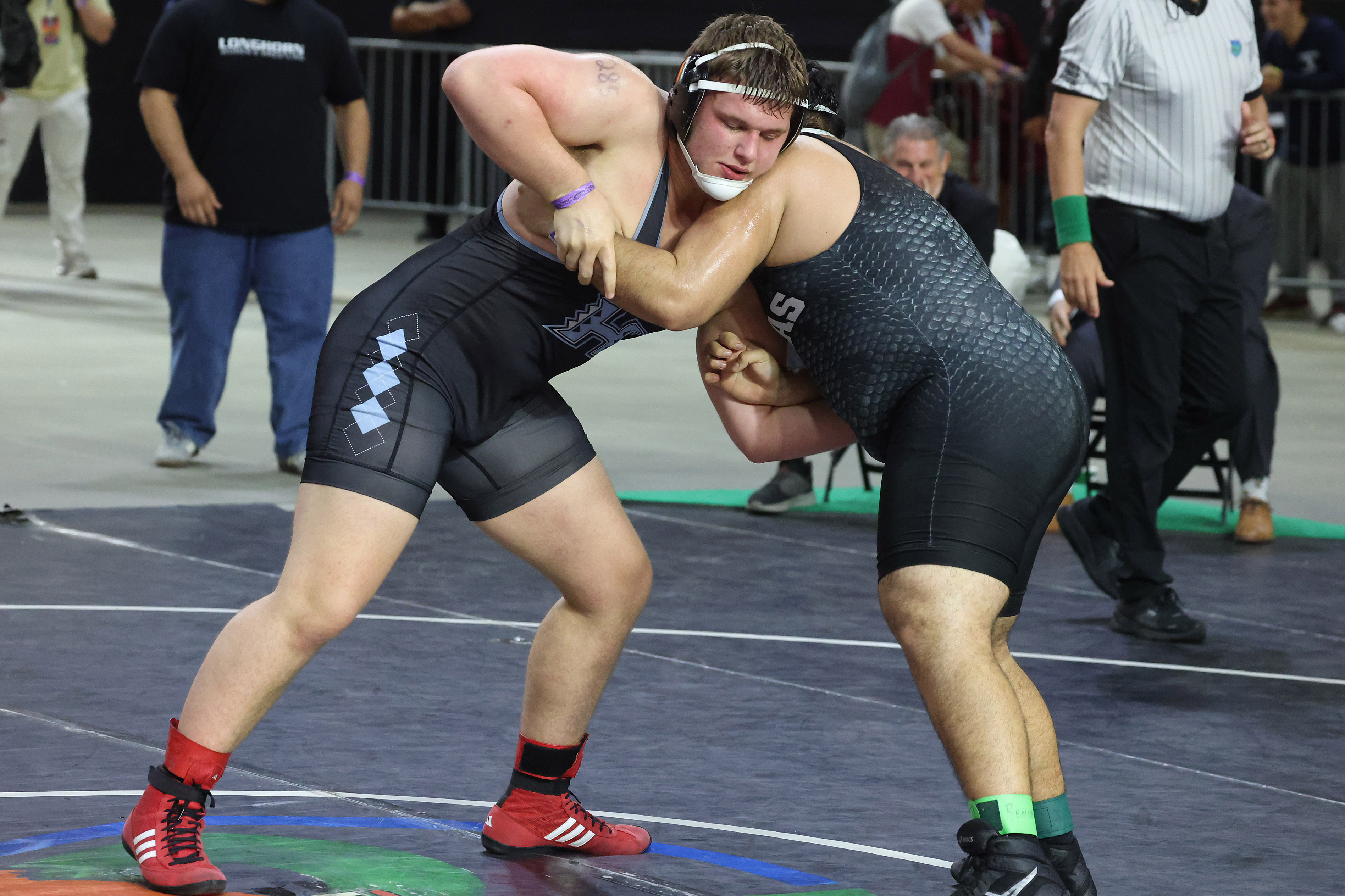 Hagerty High's Renzo Colligan , left, controls Park Vista's Raymundo...