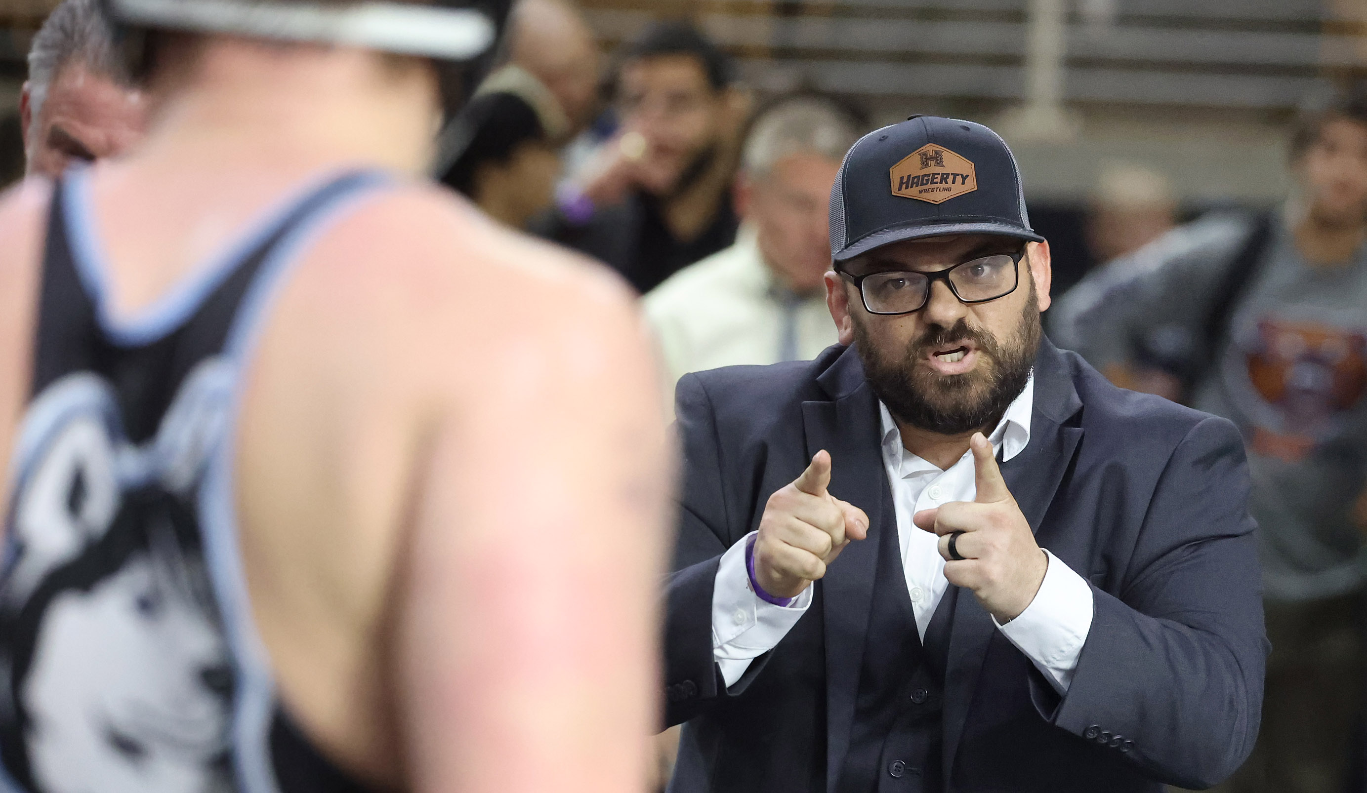 Hagerty High coach Scotty Diaz celebrates during the FHSAA Wrestling...