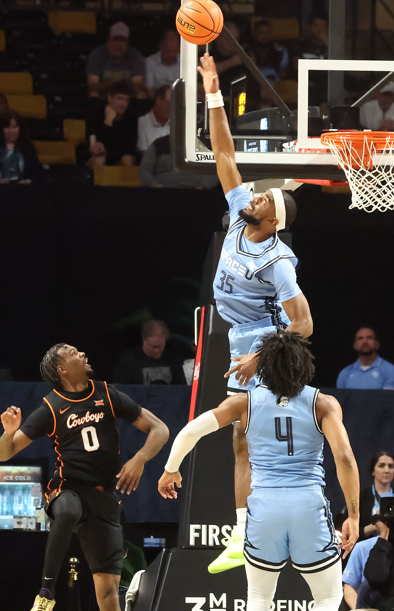 UCF forward Devan Cambridge (35) leaps to block a shot...