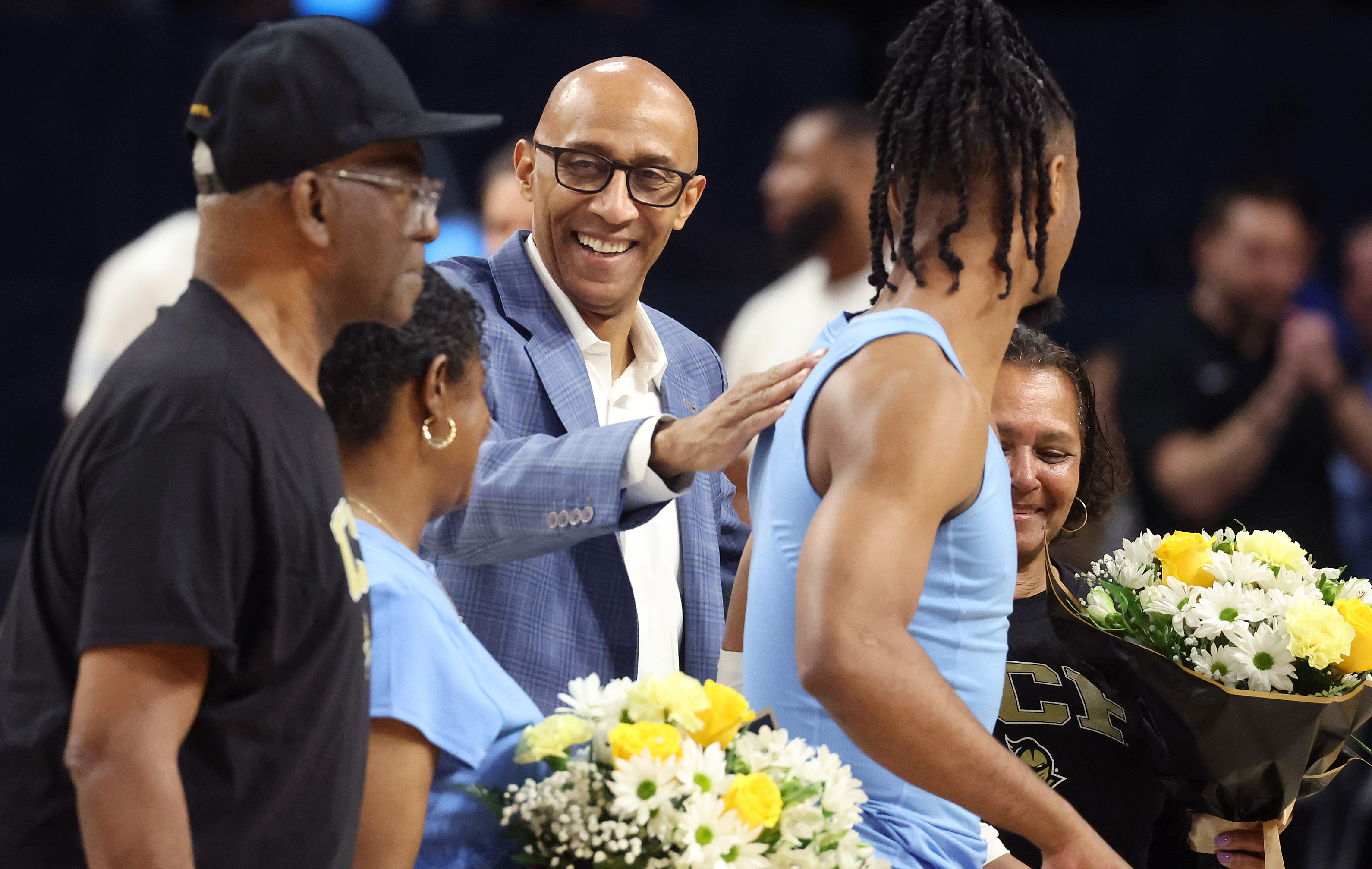 UCF head coach Johnny Dawkins greets athletes before the Oklahoma...