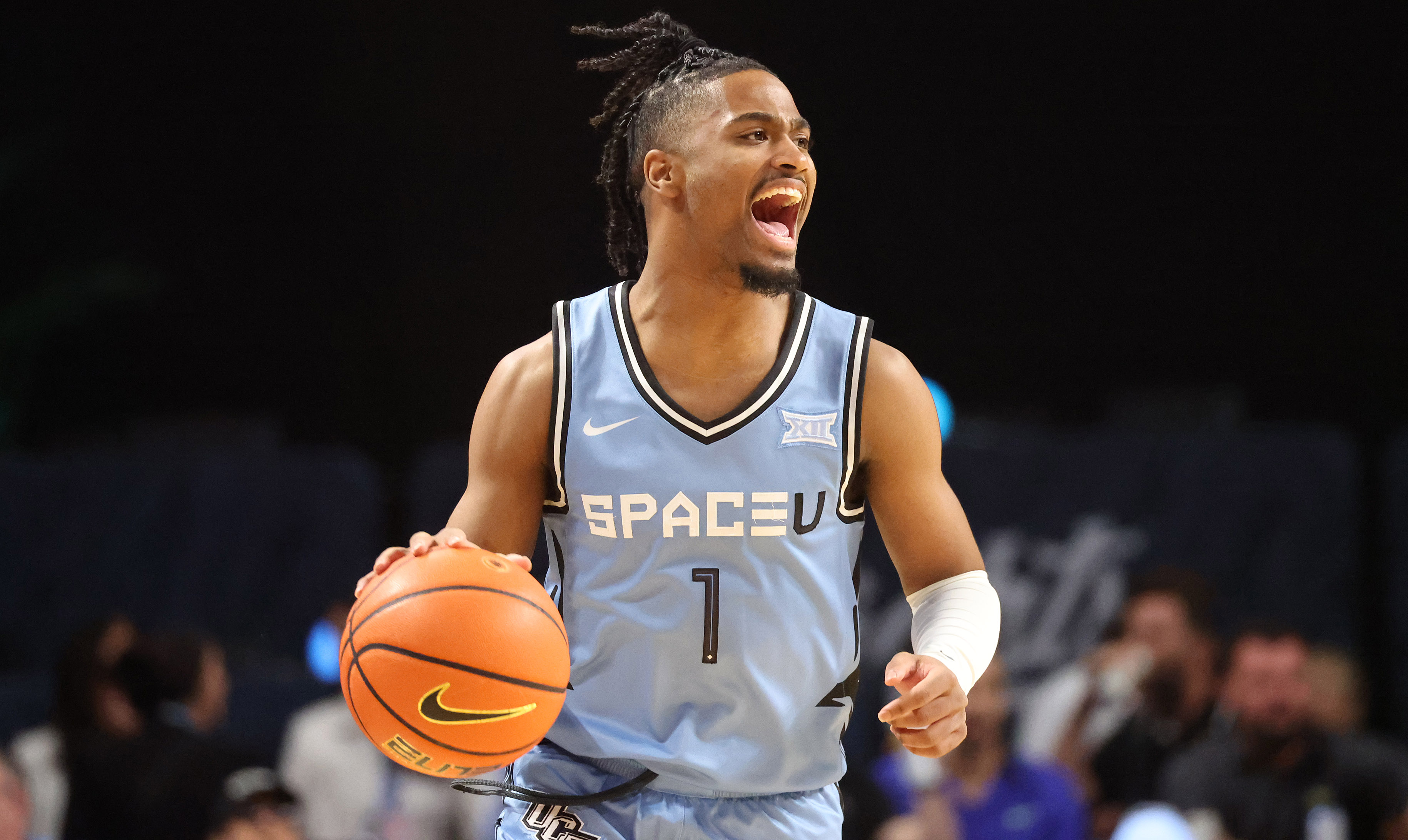 UCF guard Themus Fulks calls a play during the Oklahoma...