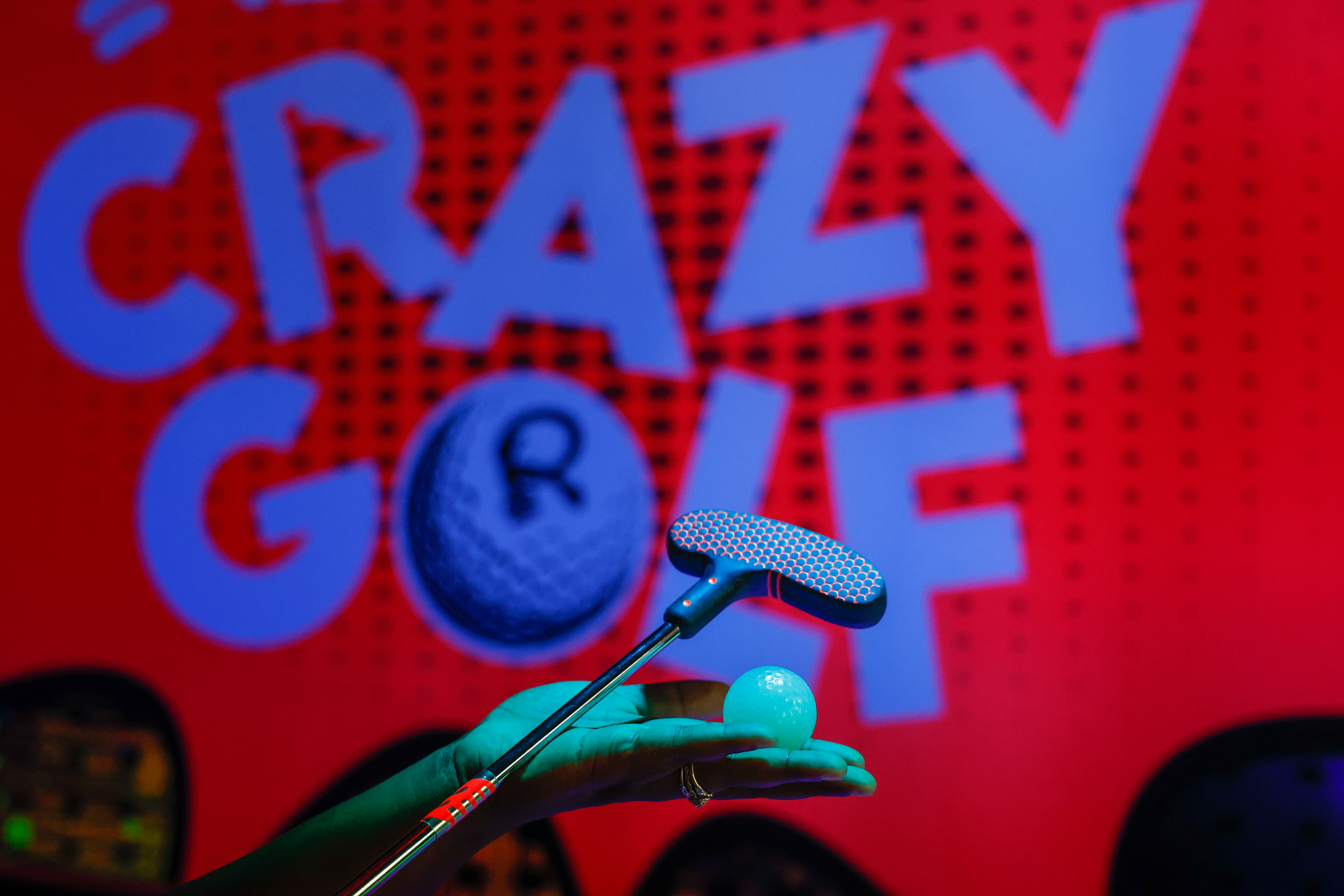 Golf balls glow and interact with the Ripleyâs Crazy Golf...