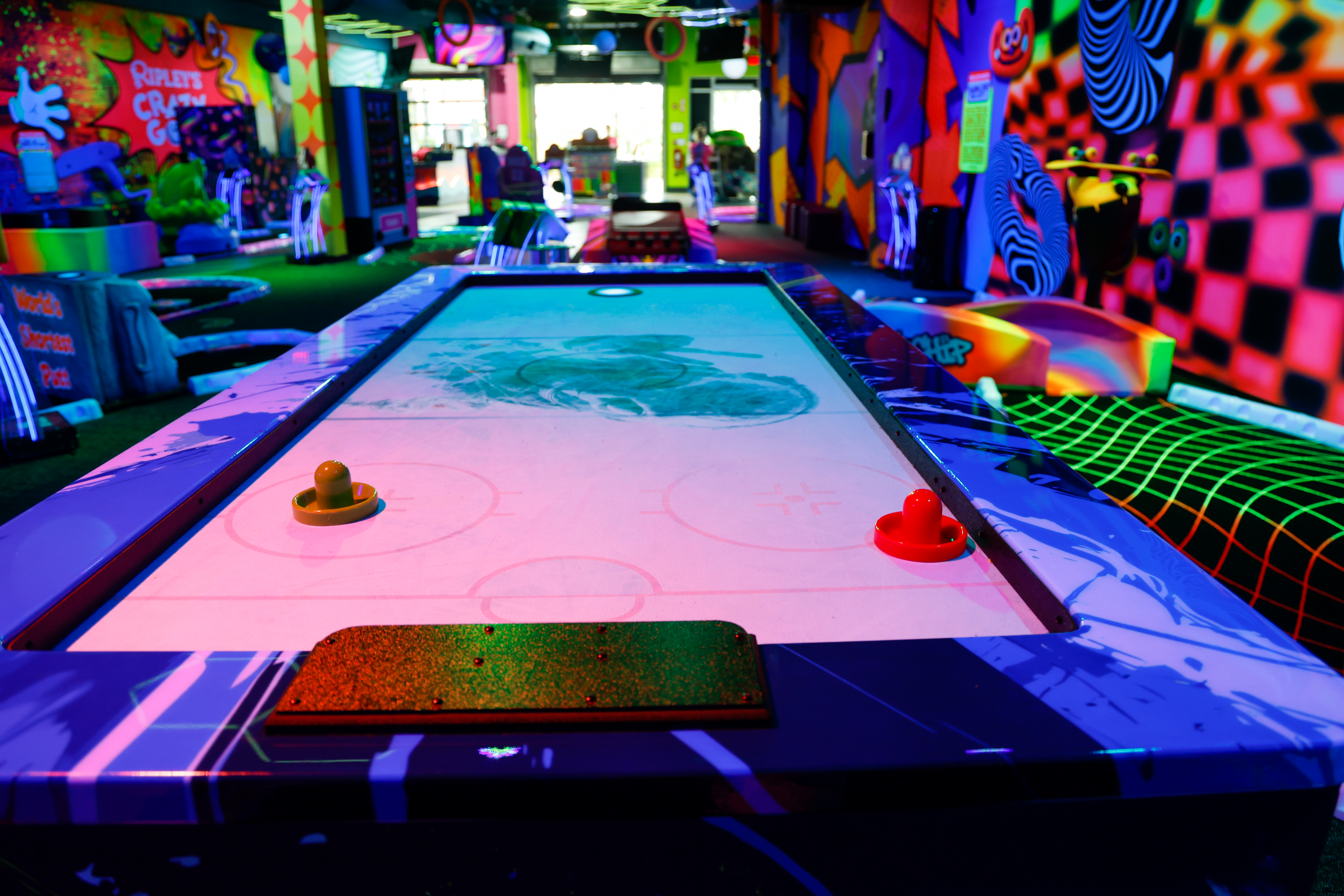 An air-hockey-inspired hole on the course at Ripleyâs Crazy Golf...