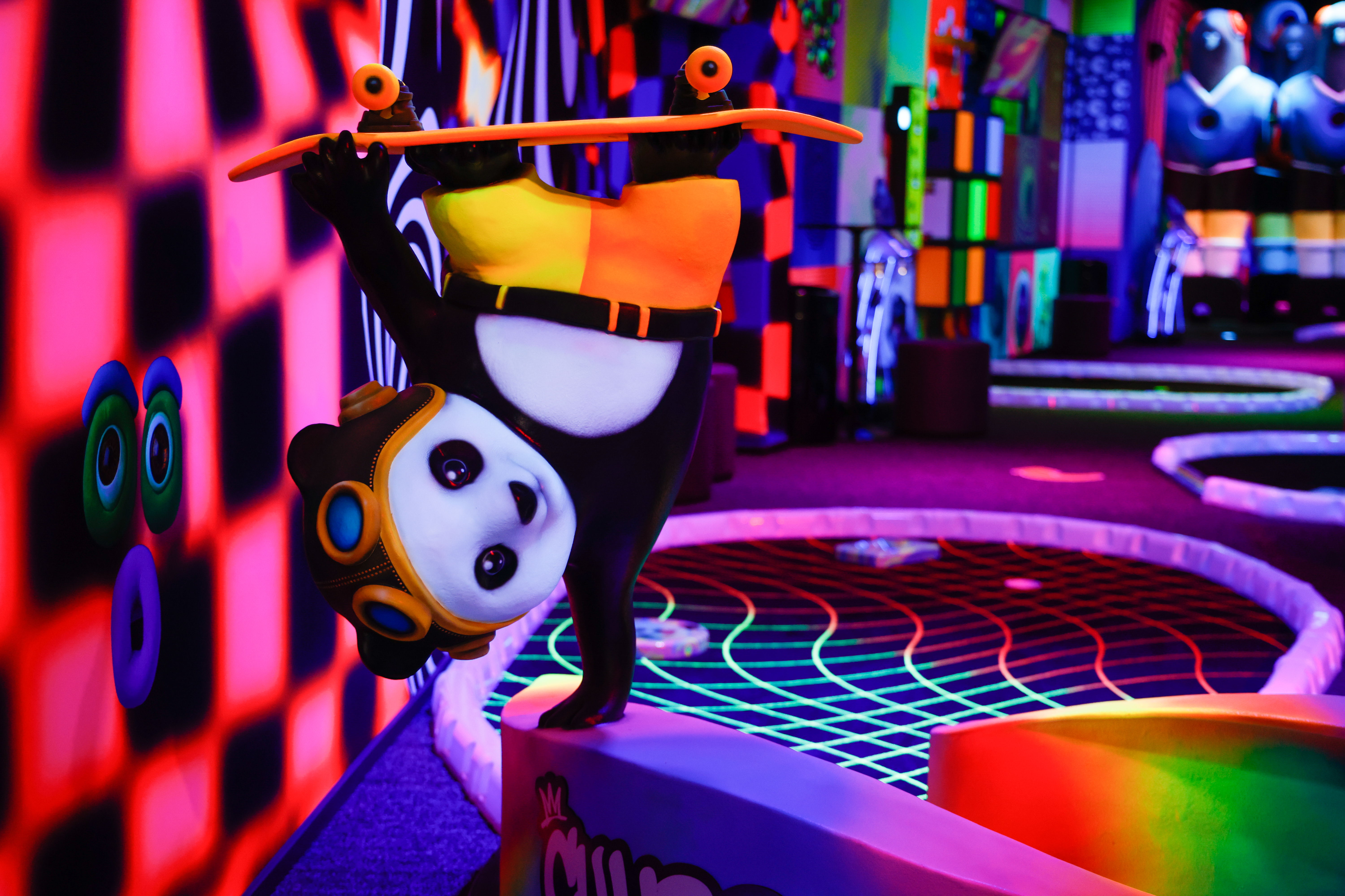 A skateboarding panda on the Chubby Chip hole at the...