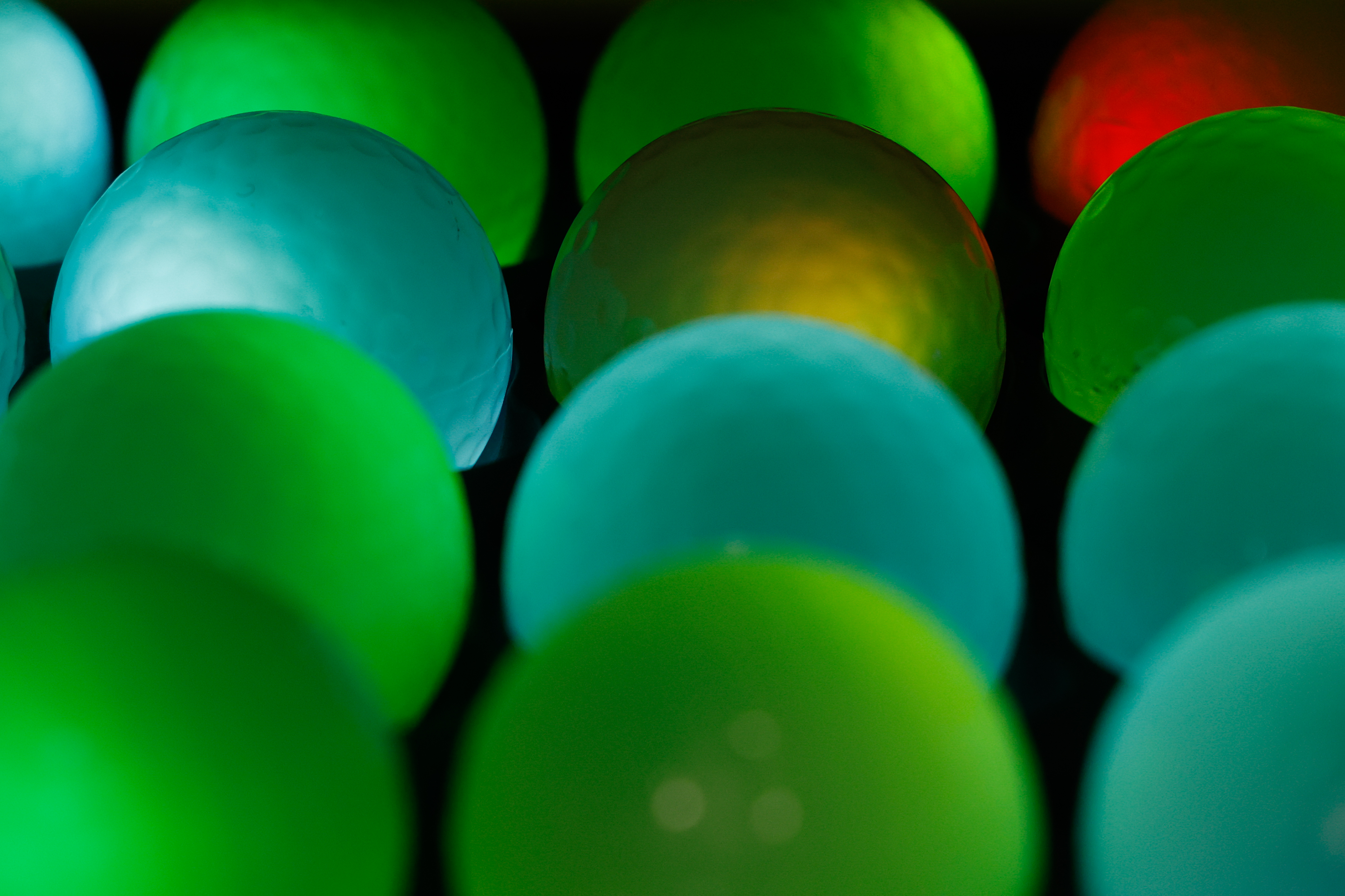 Golf balls glow and interact with the Ripleyâs Crazy Golf...