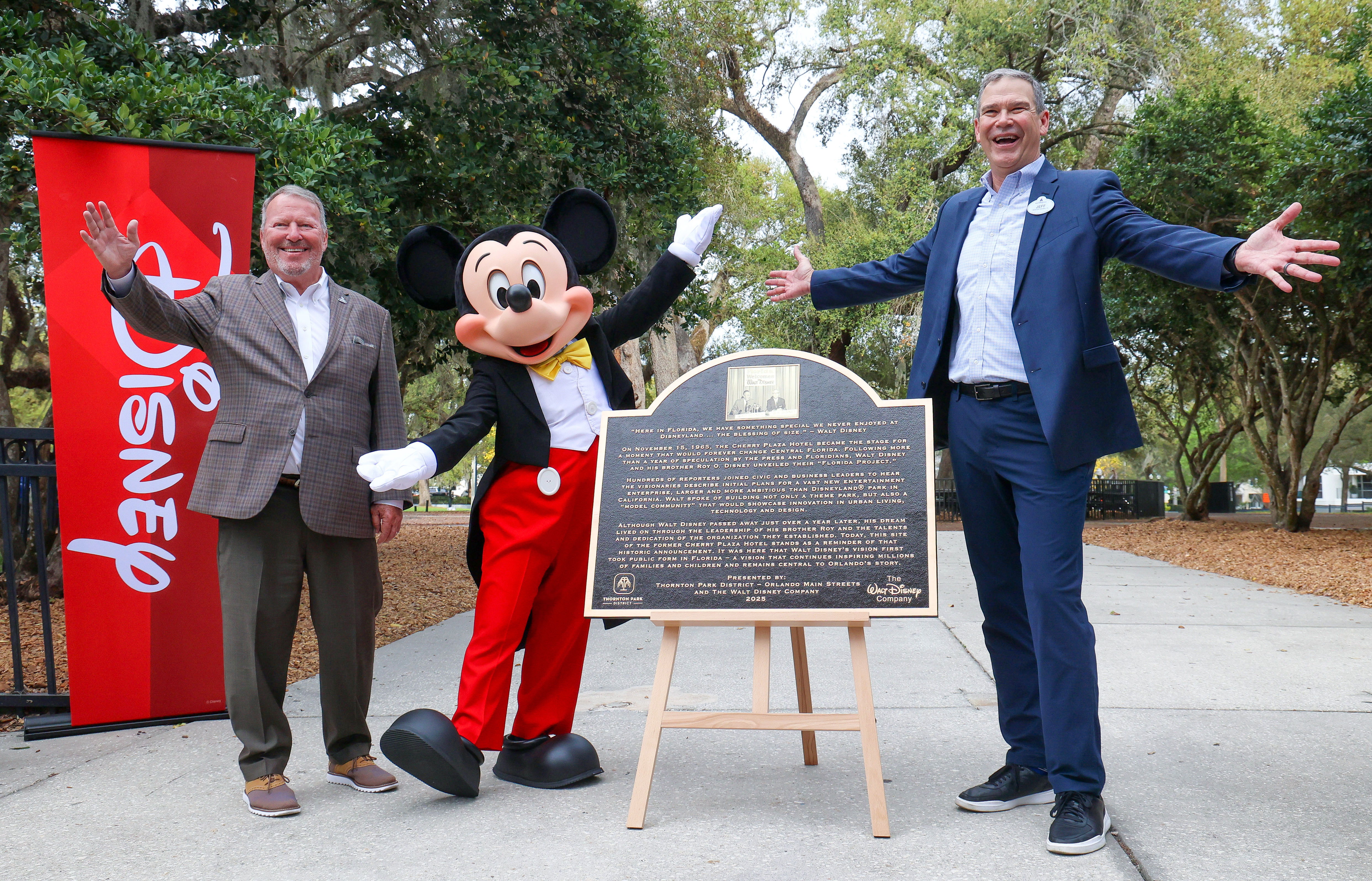 Orlando mayor Buddy Dyer, left, and Walt Disney World President...
