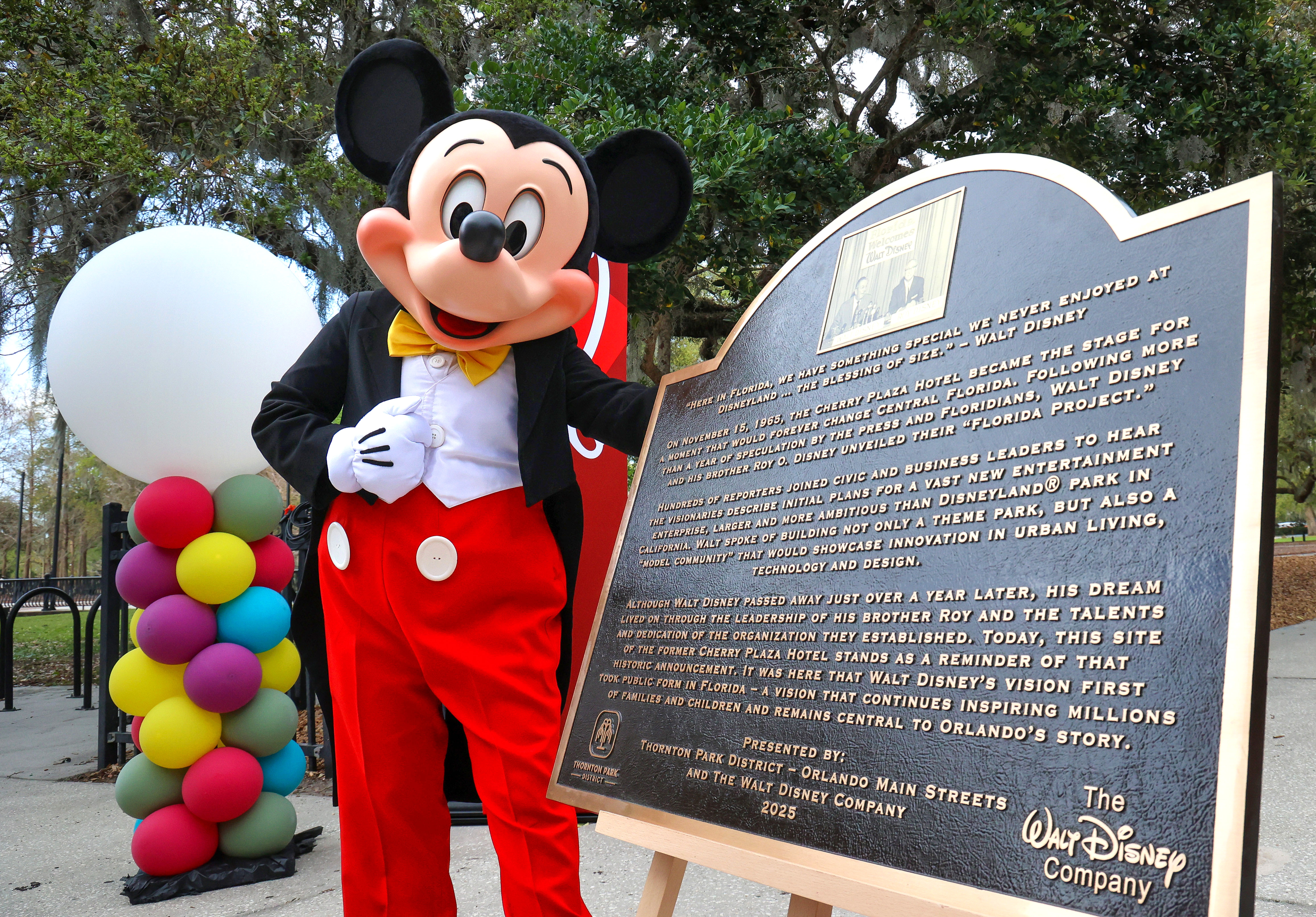Mickey Mouse celebrates the unveiling of the plaque commemorating the...
