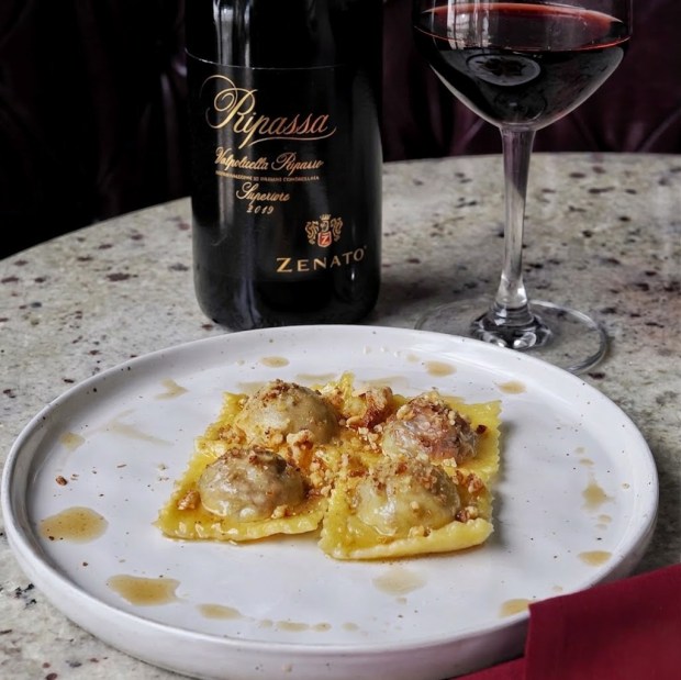 Seasonal "fatti-a-mano" handmade pasta (spinach and ricotta filing with brown butter and candied nuts) from VINIA Wine & Kitchen. (Photo courtesy Lisa Wilk/TasteCookSip.com)