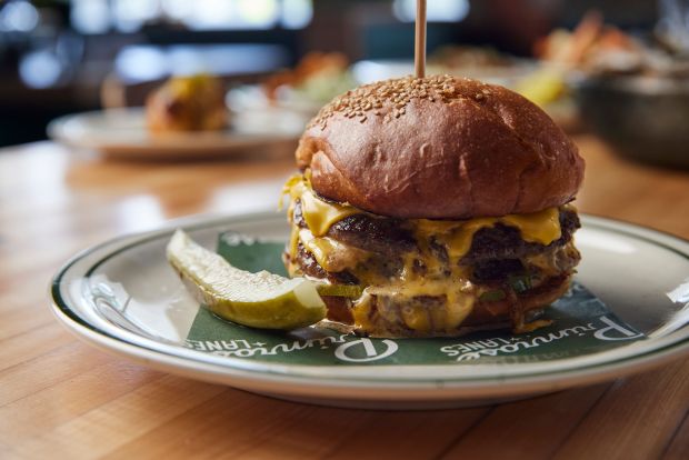 The Primrose Lanes OKC Smashburger has survived multiple menu changes and remains a top seller. (Photo courtesy Blake Jonez)