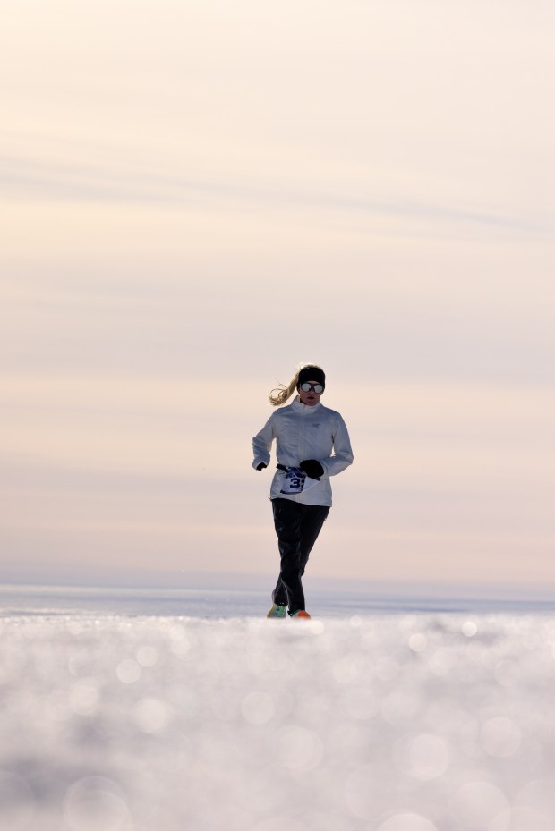 Orlando resident Beth Reed runs in Antarctica during the World Marathon Challenge, which had runners completing seven marathons in as many days on all seven continents. (Kyle LaFerriere/Courtesy of World Marathon Challenge)