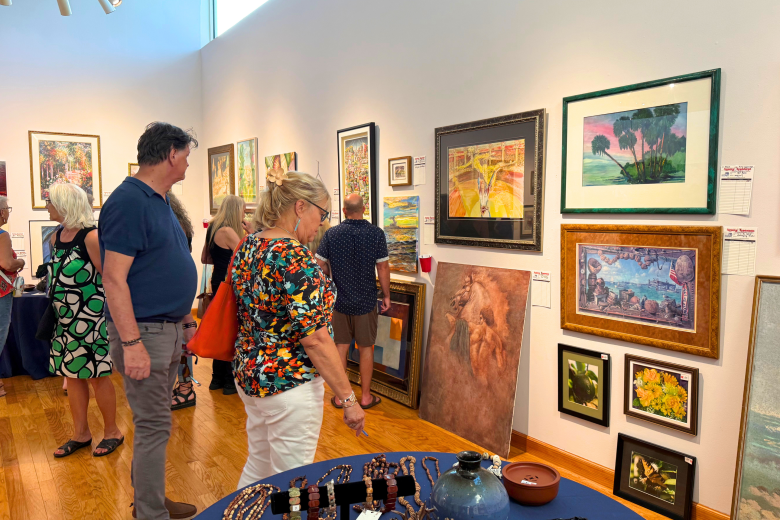 People browsing art at Dunedin Fine Art Center