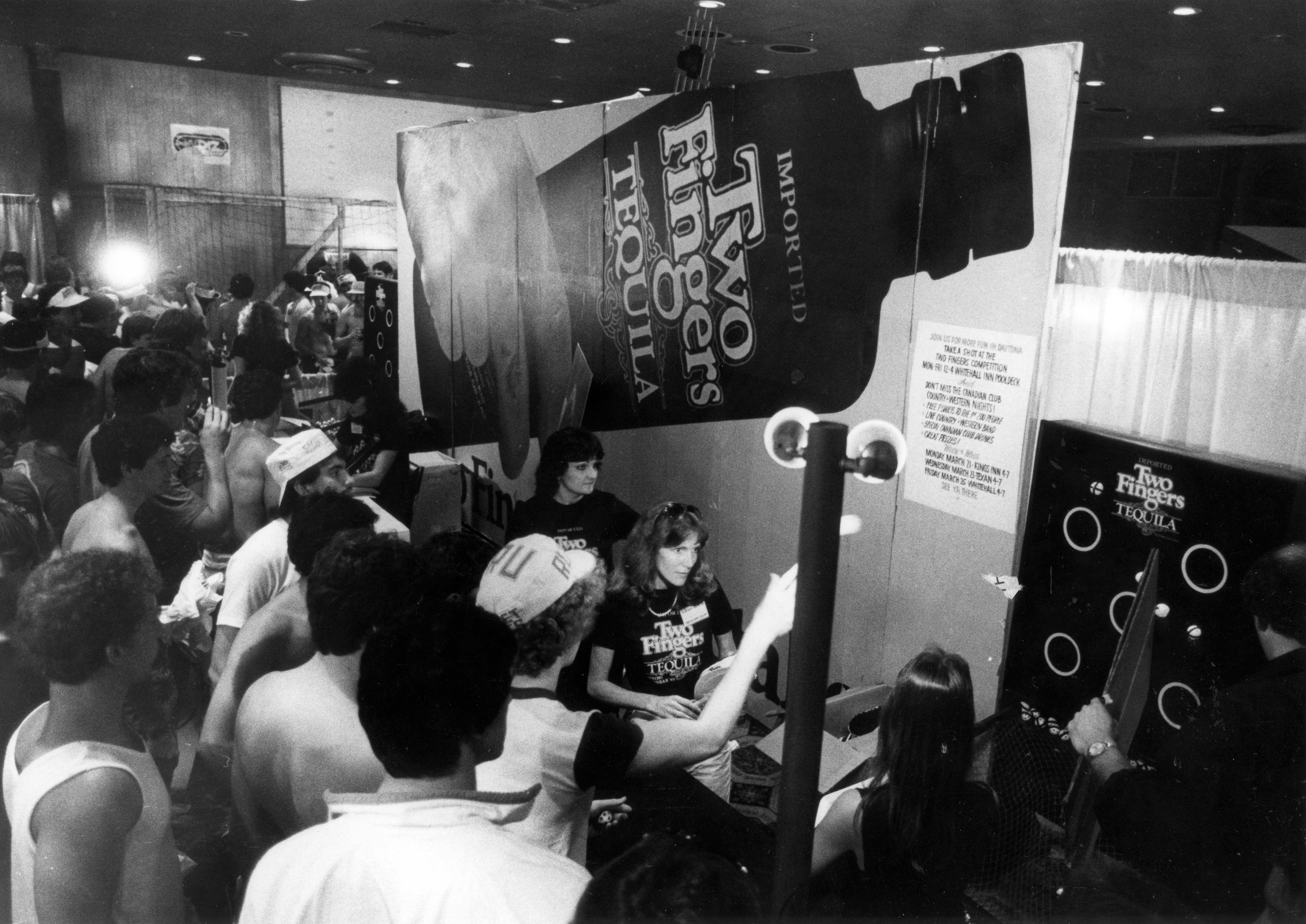 A vendor booth sponsored by 'Two Fingers Tequila' at the...