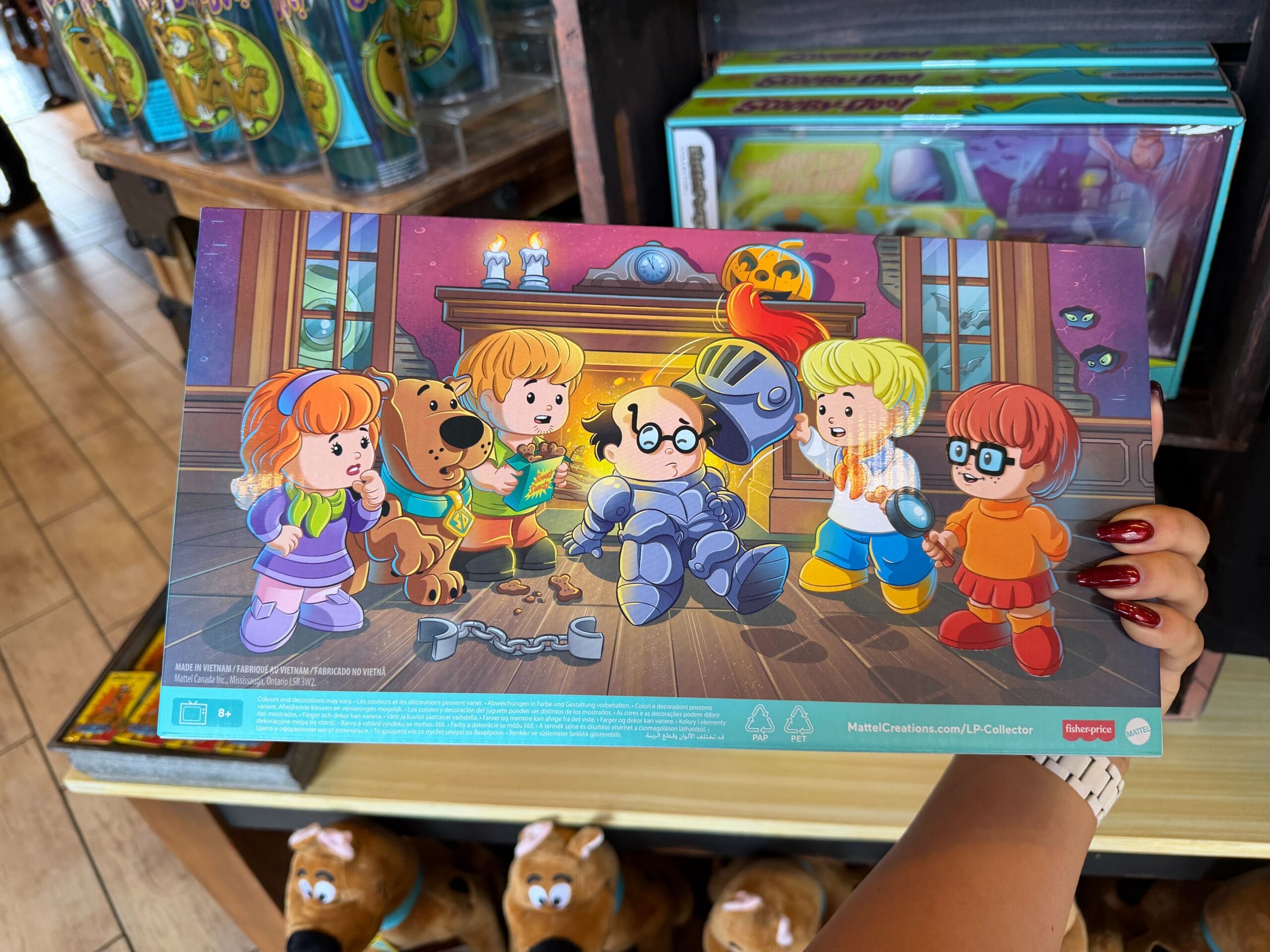 The back features a mystery solved by those meddling kids. We found the set in the San Francisco Candy Factory in Universal Studios Florida.