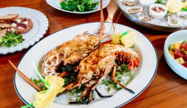 Grilled lobster with oysters and seafood dishes at Oystercatchers in Tampa Bay
