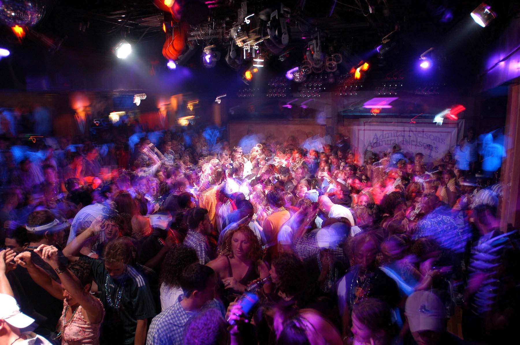 Spring breakers party on a packed dance floor on Thursday,...