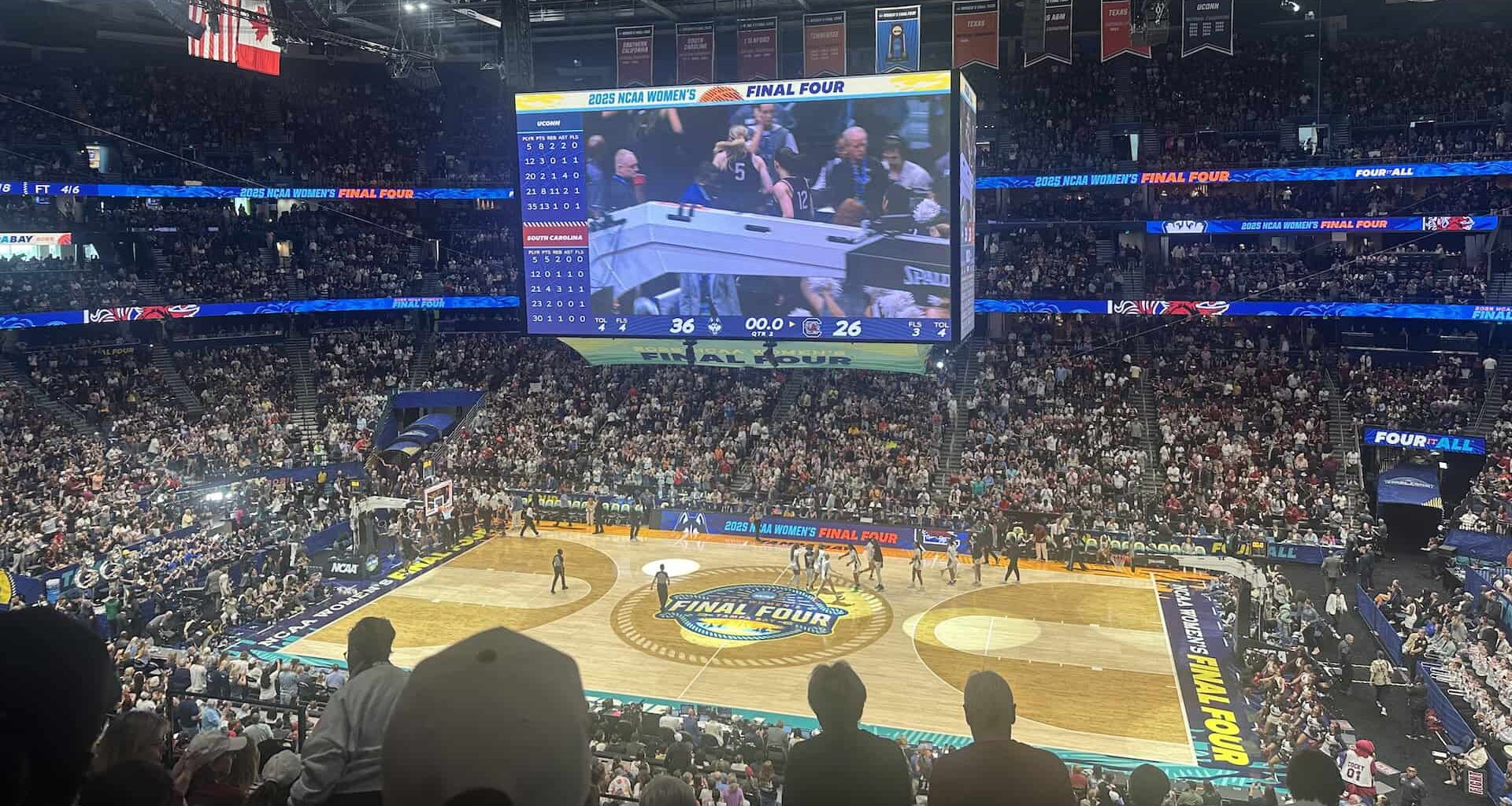 a basketball court with lights on it