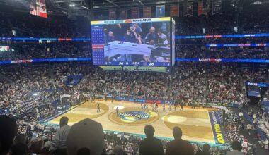 a basketball court with lights on it