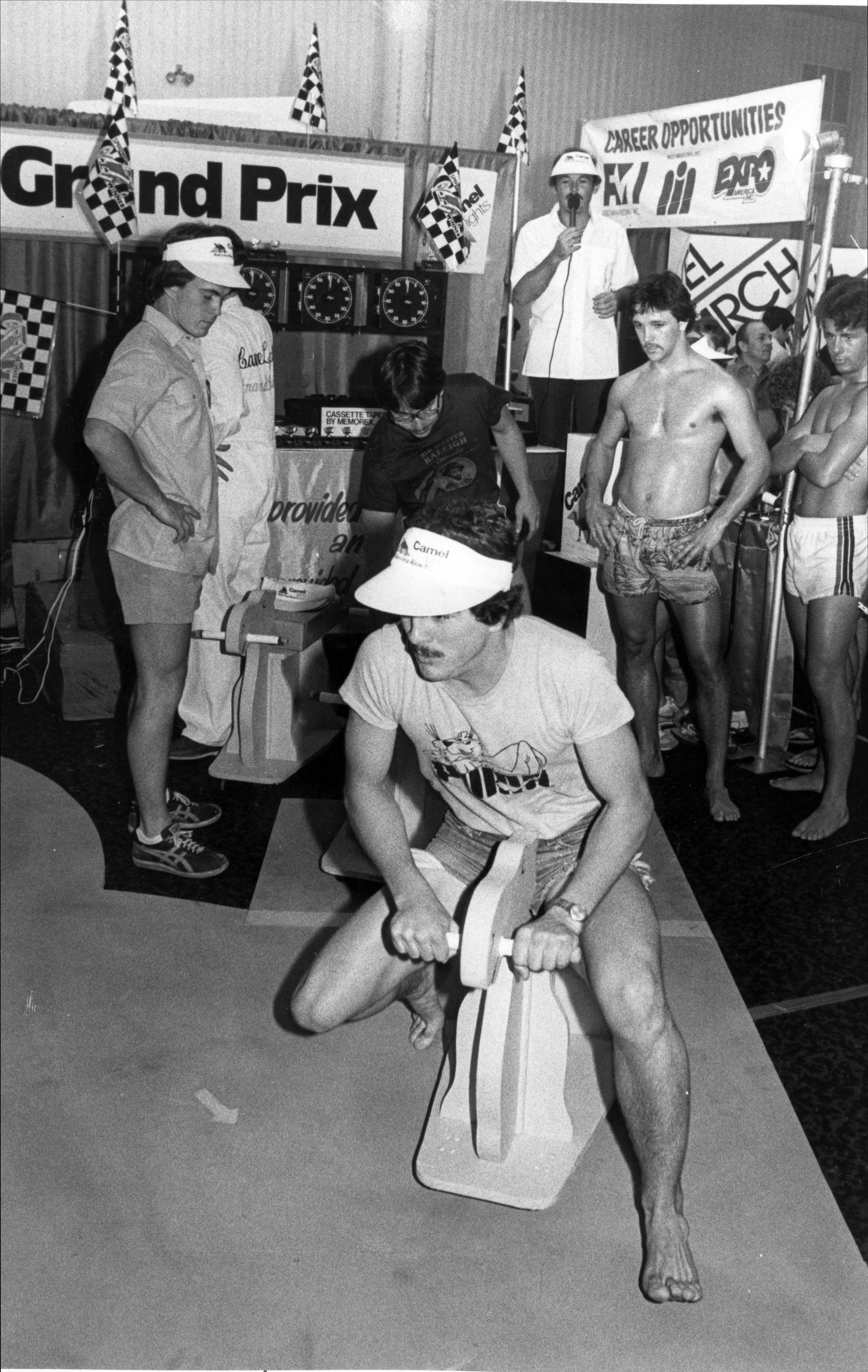 Dan Willette of East Lansing, MI, scoots a wooden camel...