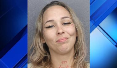 Broward woman grins in mugshot after shooting sister, cops say