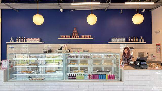 Sotiria Sourlis at her restaurant Greek Sugar in the Thrive Art District in Fort Lauderdale. Greek Sugar sells traditional savory and sweet Greek treats.